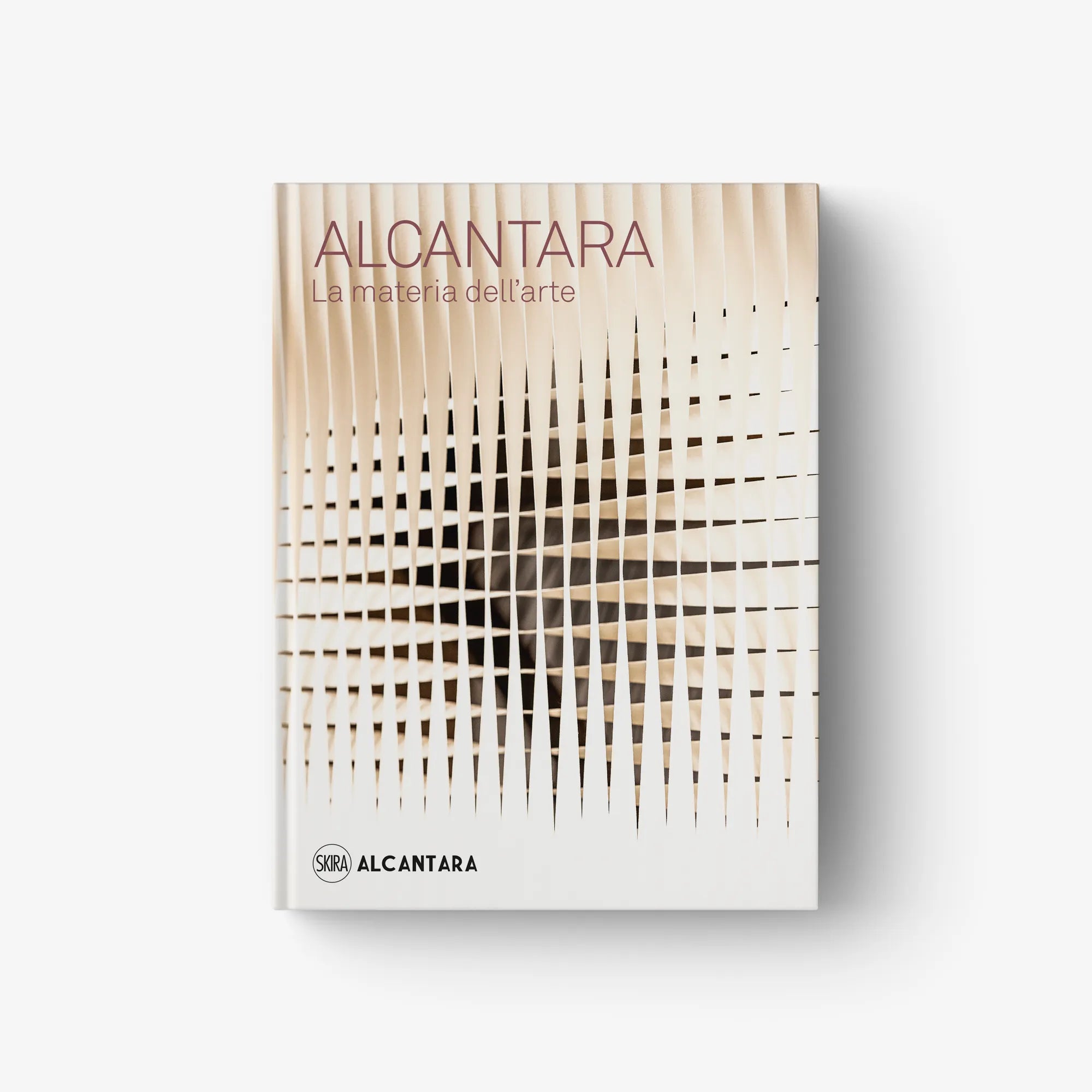ALCANTARA art book cover with beige vertical line pattern and logo text