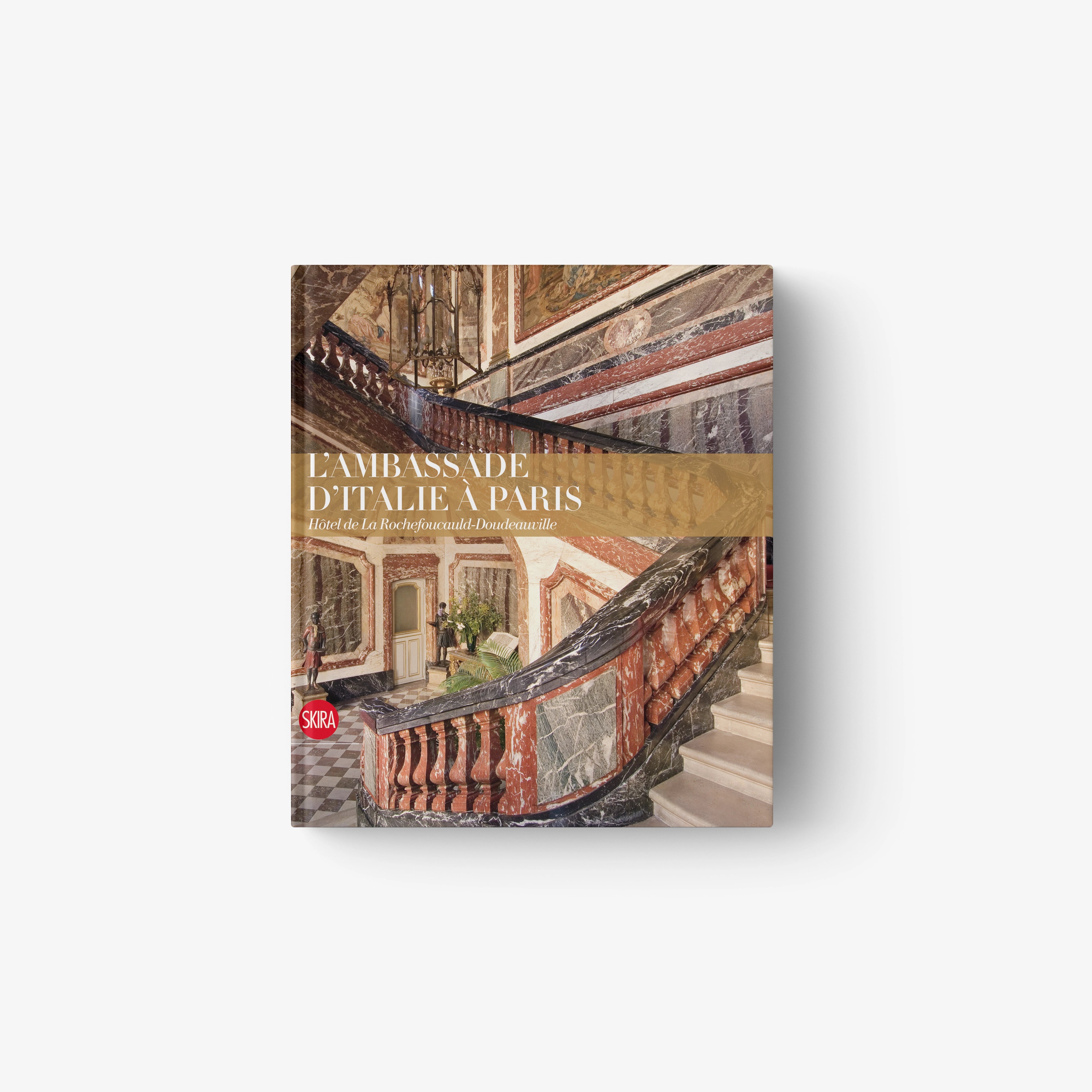 Hardcover book with architectural collage cover and gold ribbon band