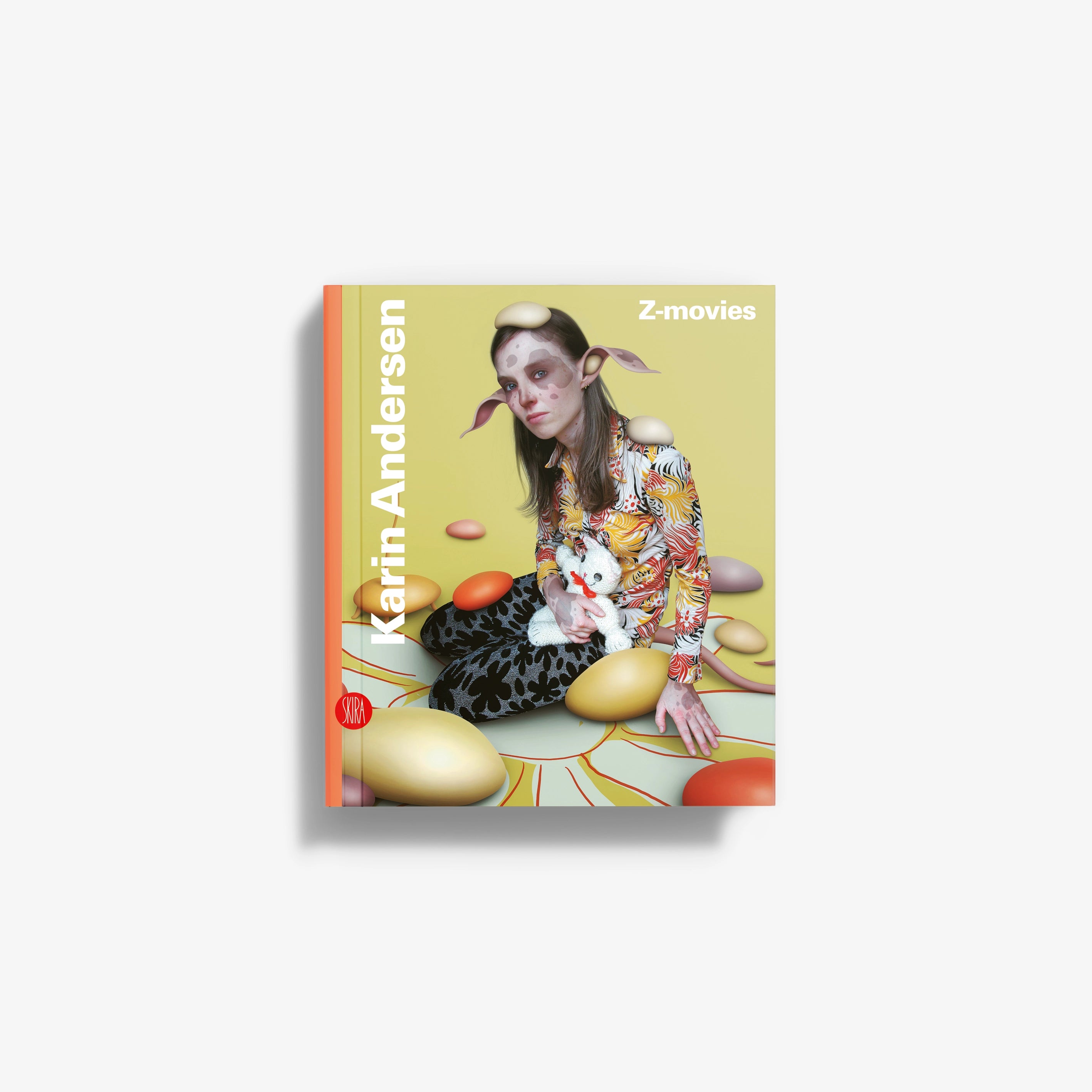 Illustrated paperback book cover with woman holding a rabbit; title Z-movies