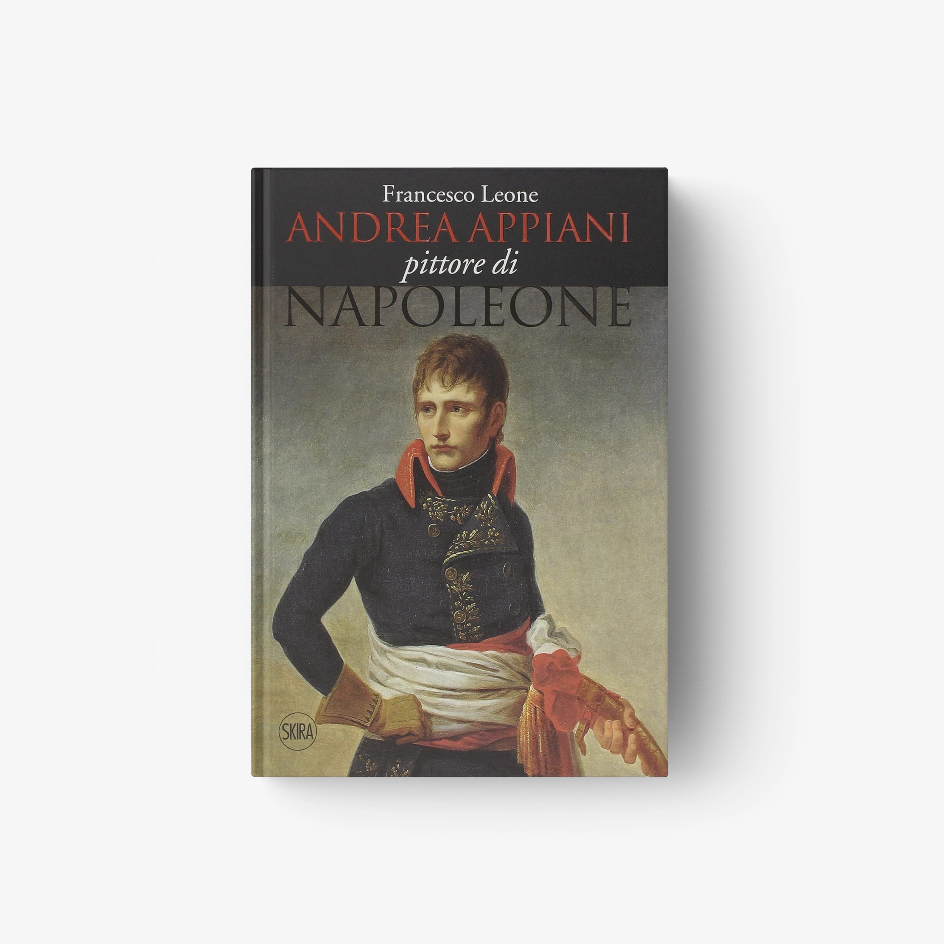 Hardcover book with cover portrait of a young man in dark coat and red sash