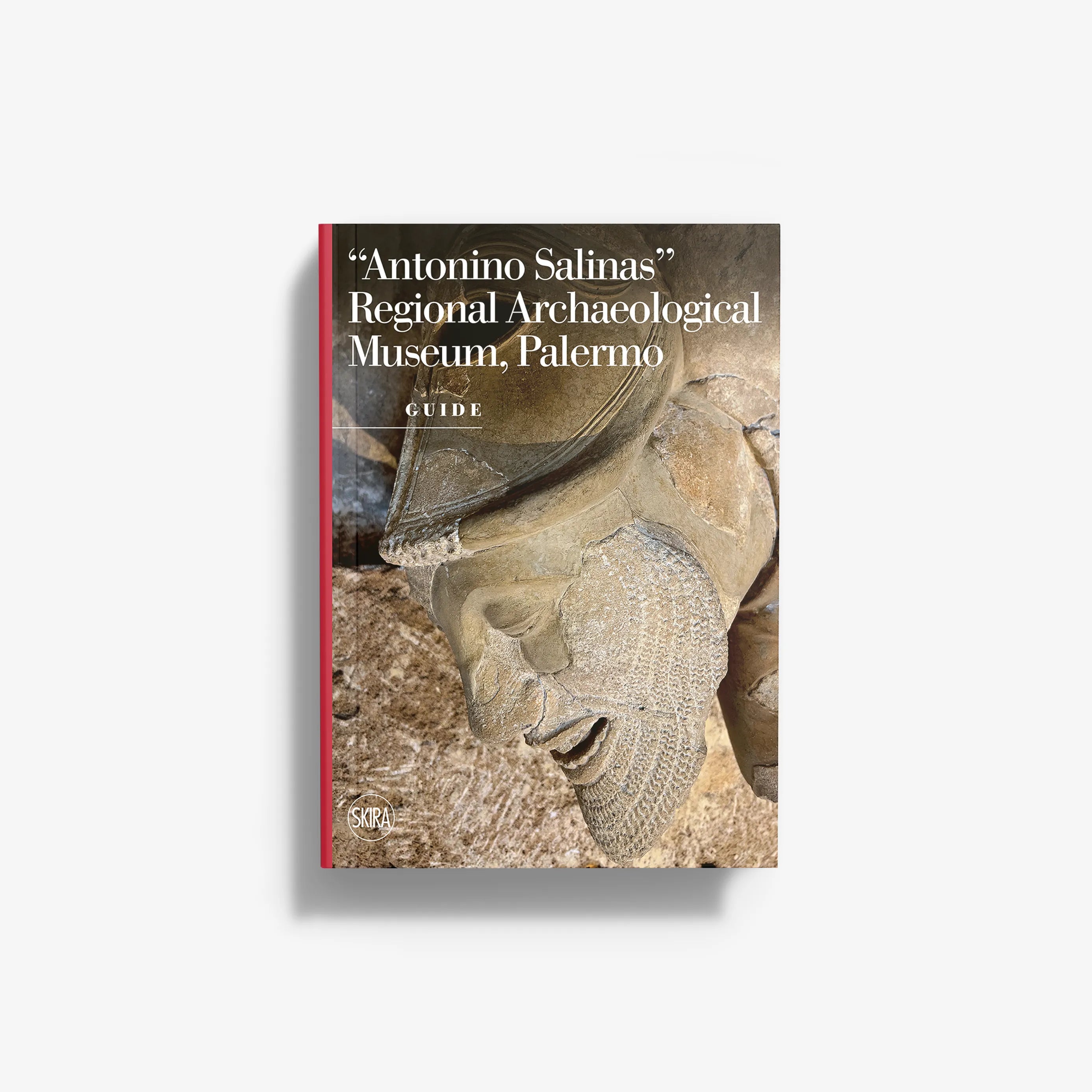 Museum guidebook in brown and black with red spine by Skira Arte, featuring ancient Greek art exhibits