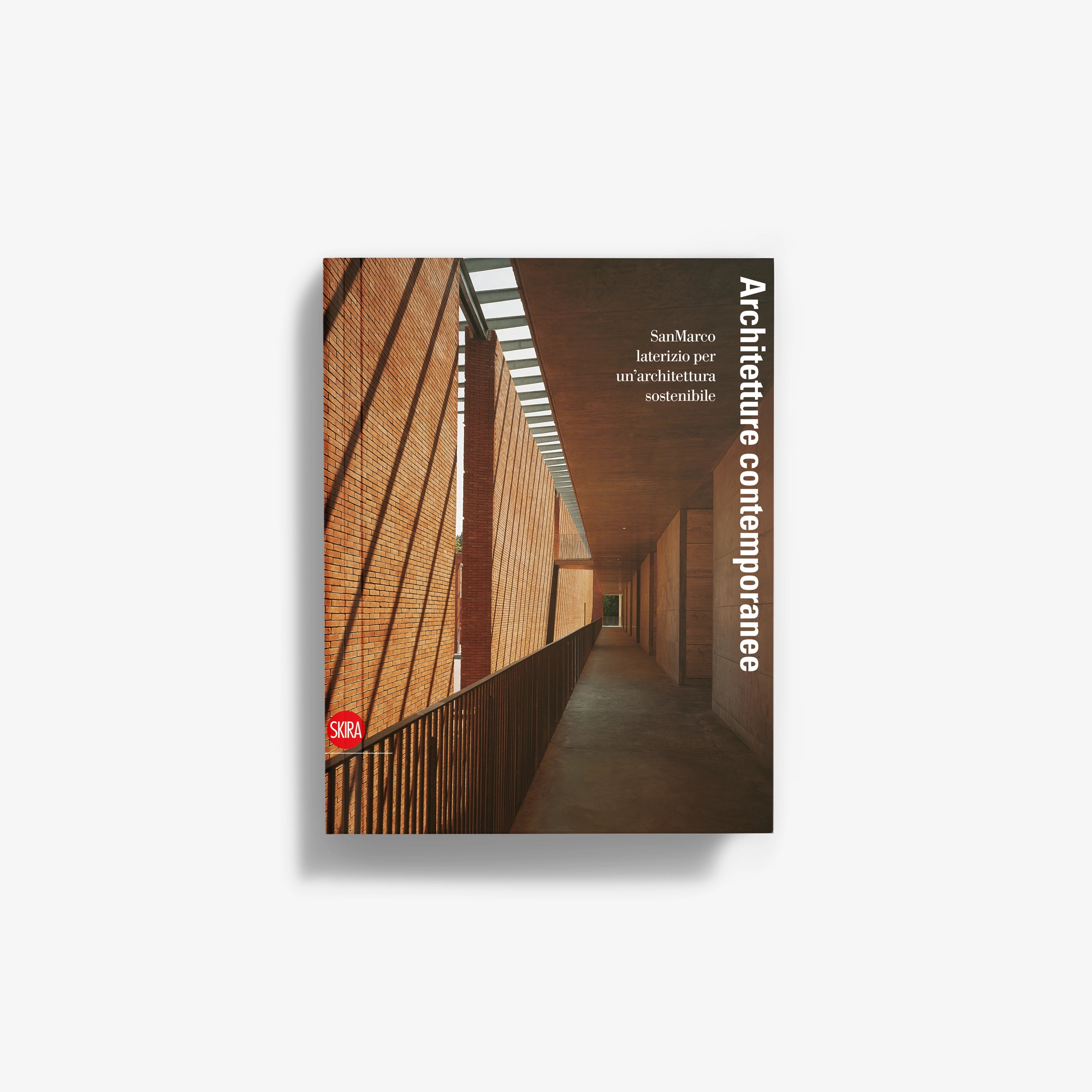 Contemporary architecture book cover with photo of modern building corridor and vertical title