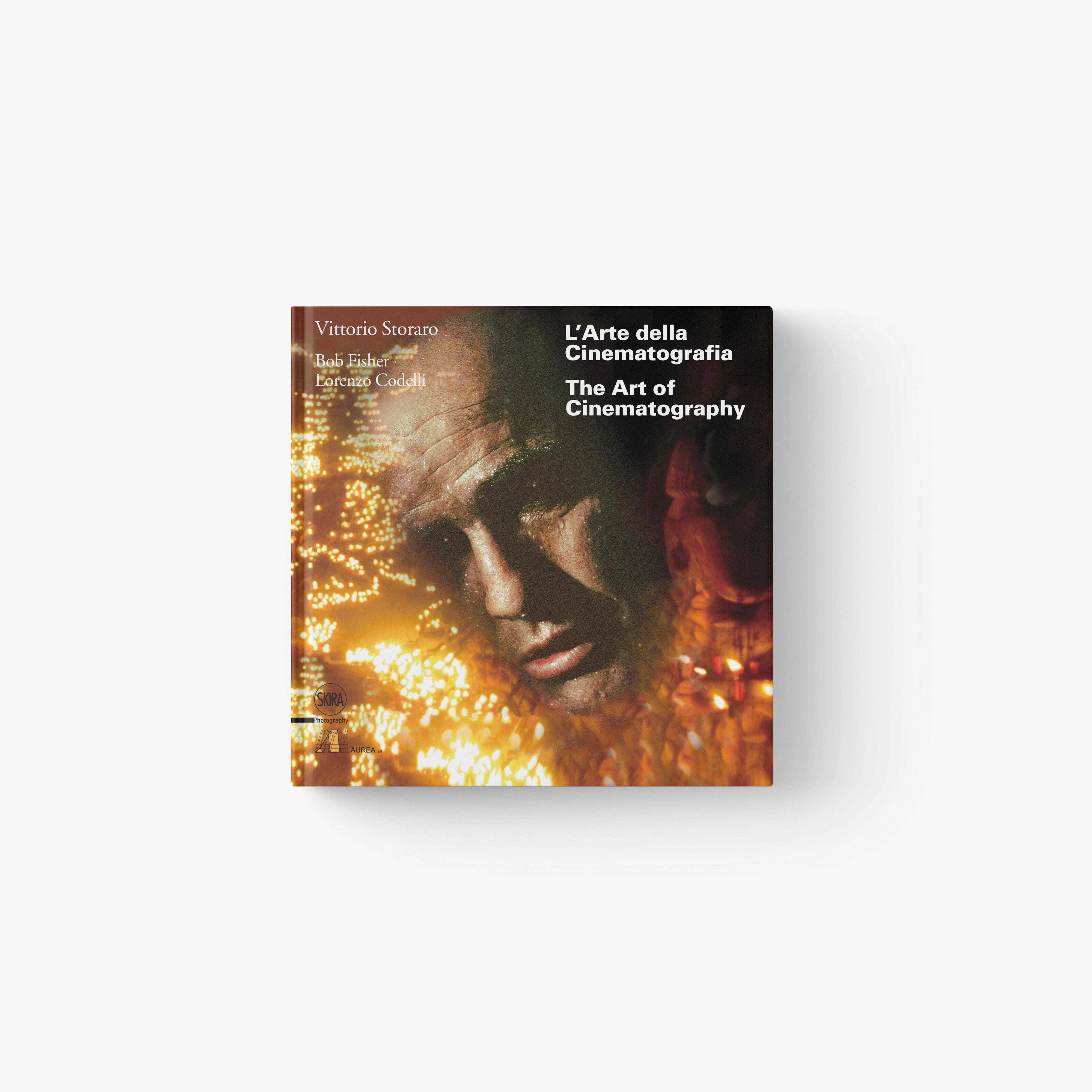 Art of Cinematography hardcover book with portrait and golden spark graphics