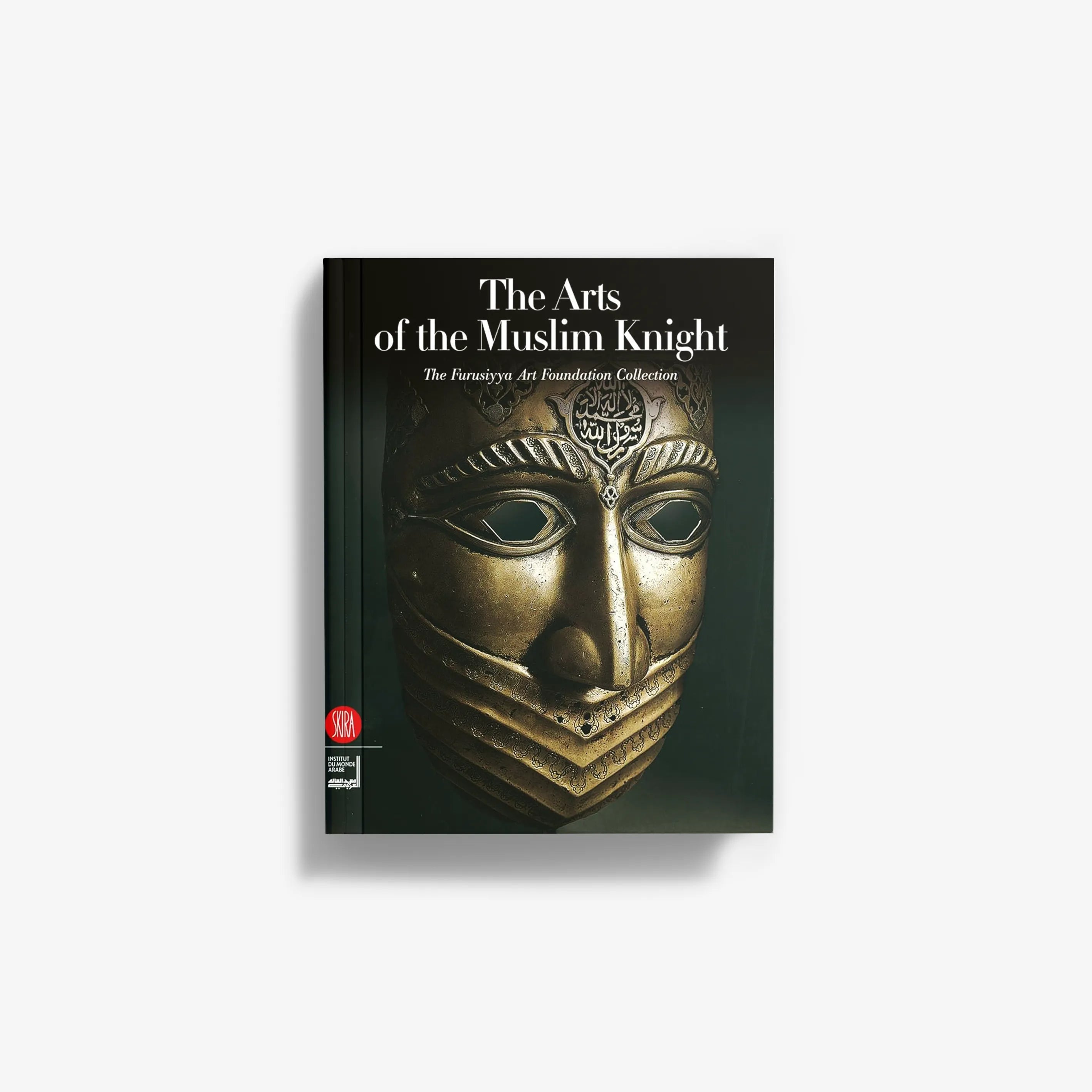 Exhibition edition book with gold knight face mask on dark green cover