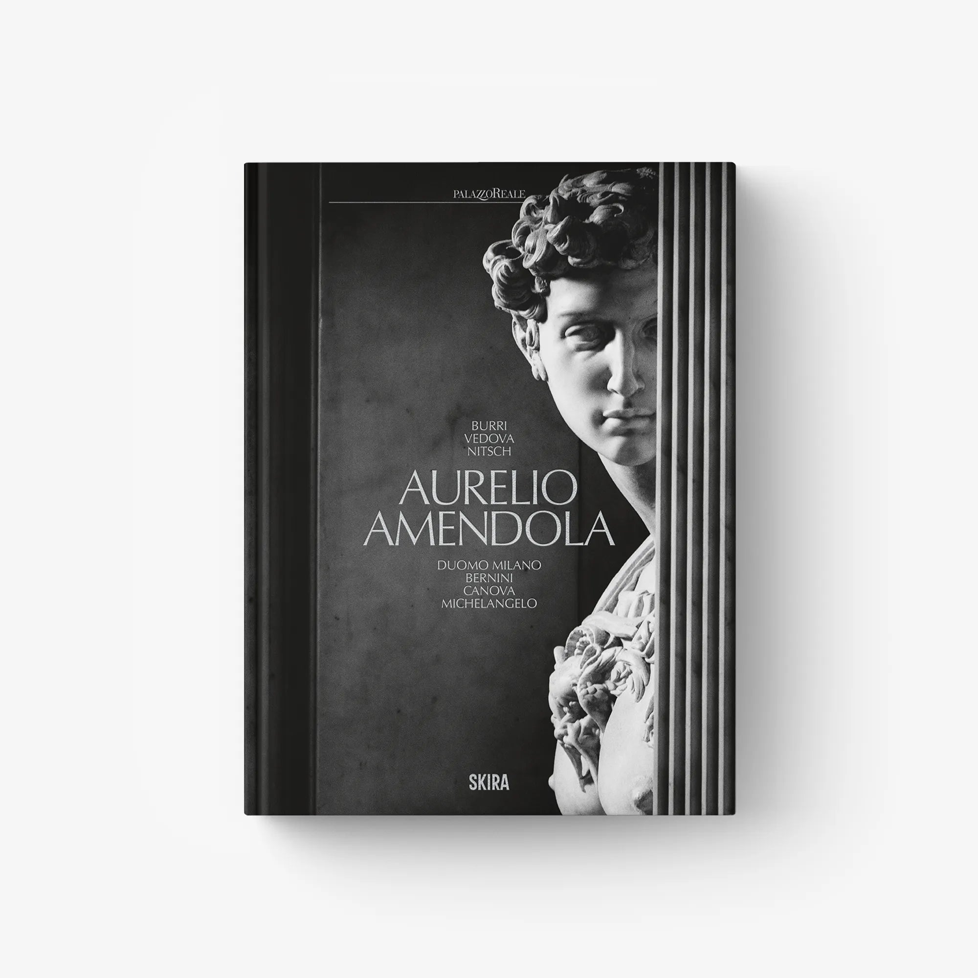 Hardcover photo book with monochrome portrait cover and floral details