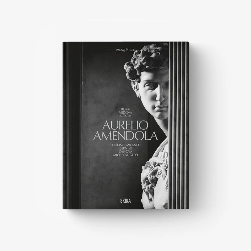 Hardcover photo book with monochrome portrait cover and floral details