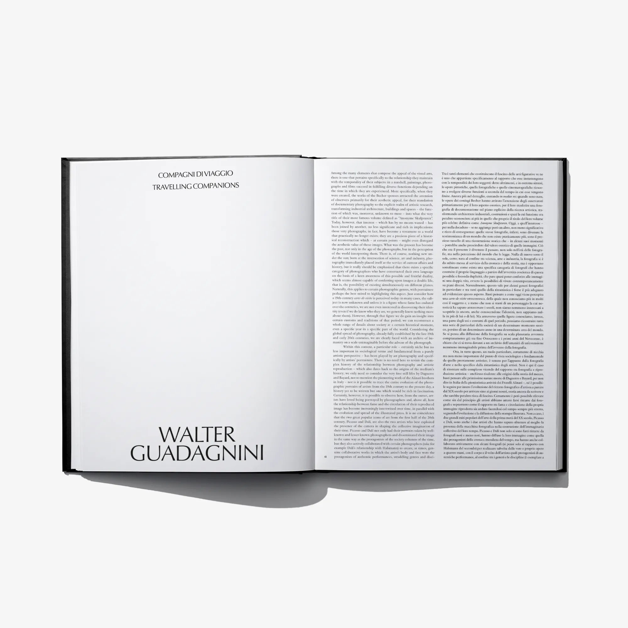 Open hardcover photo book with page heading 'Walter Guadagnini' and text
