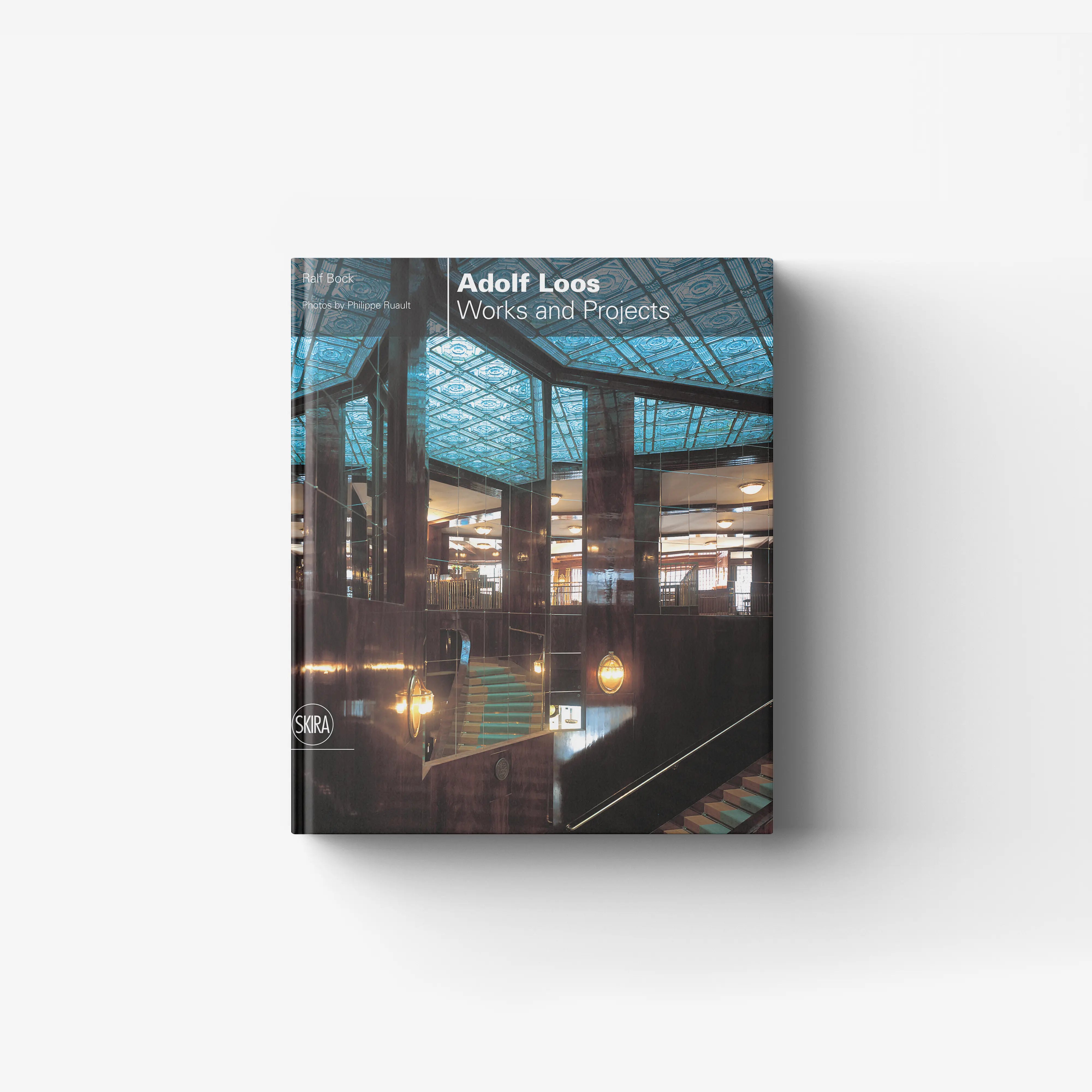 Architecture monograph book by Skira Arte with blue patterned cover and previously unpublished photographic documentation