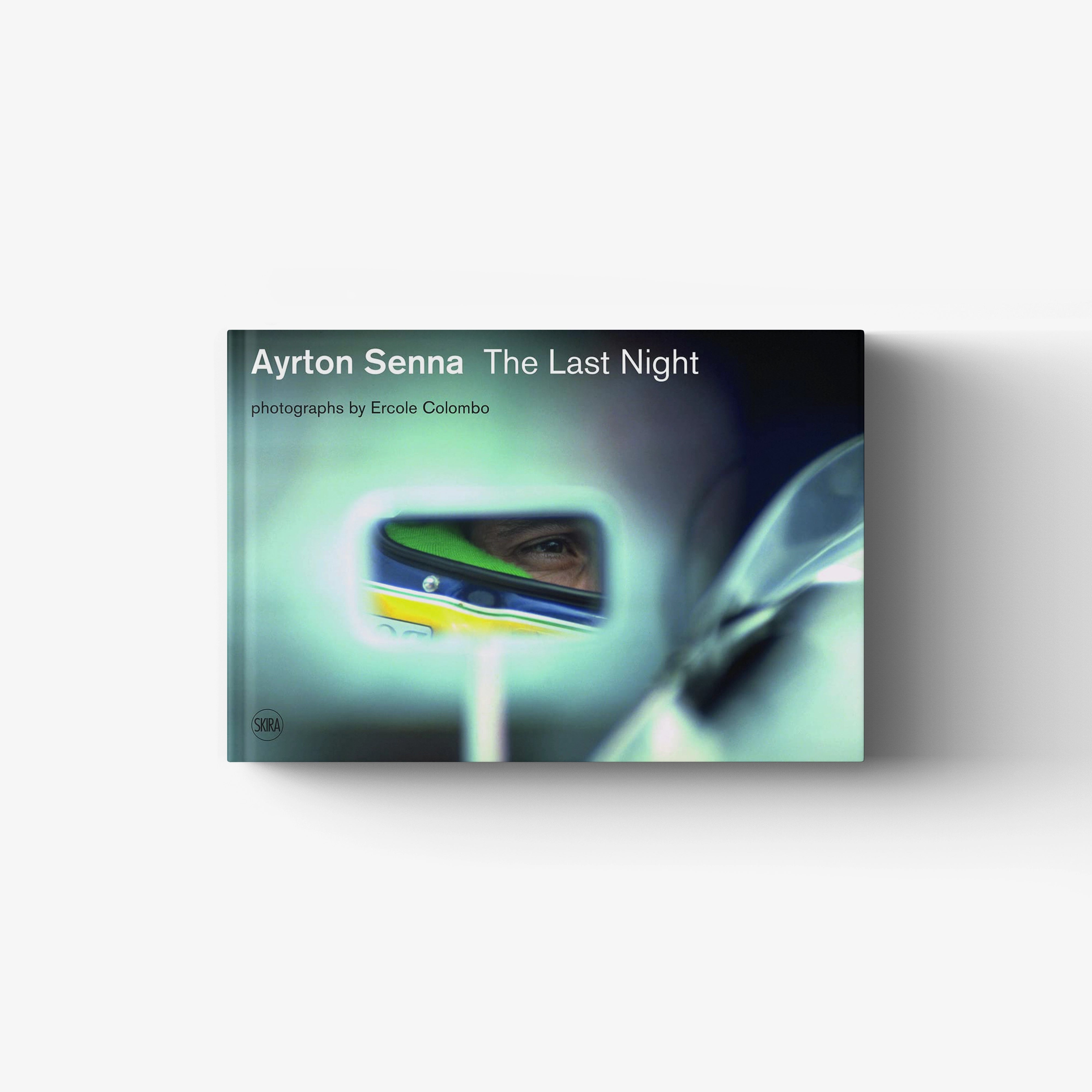 Motoring monograph book in dark teal and blue with Ayrton Senna text, Skira Arte, approximately one hundred photographs