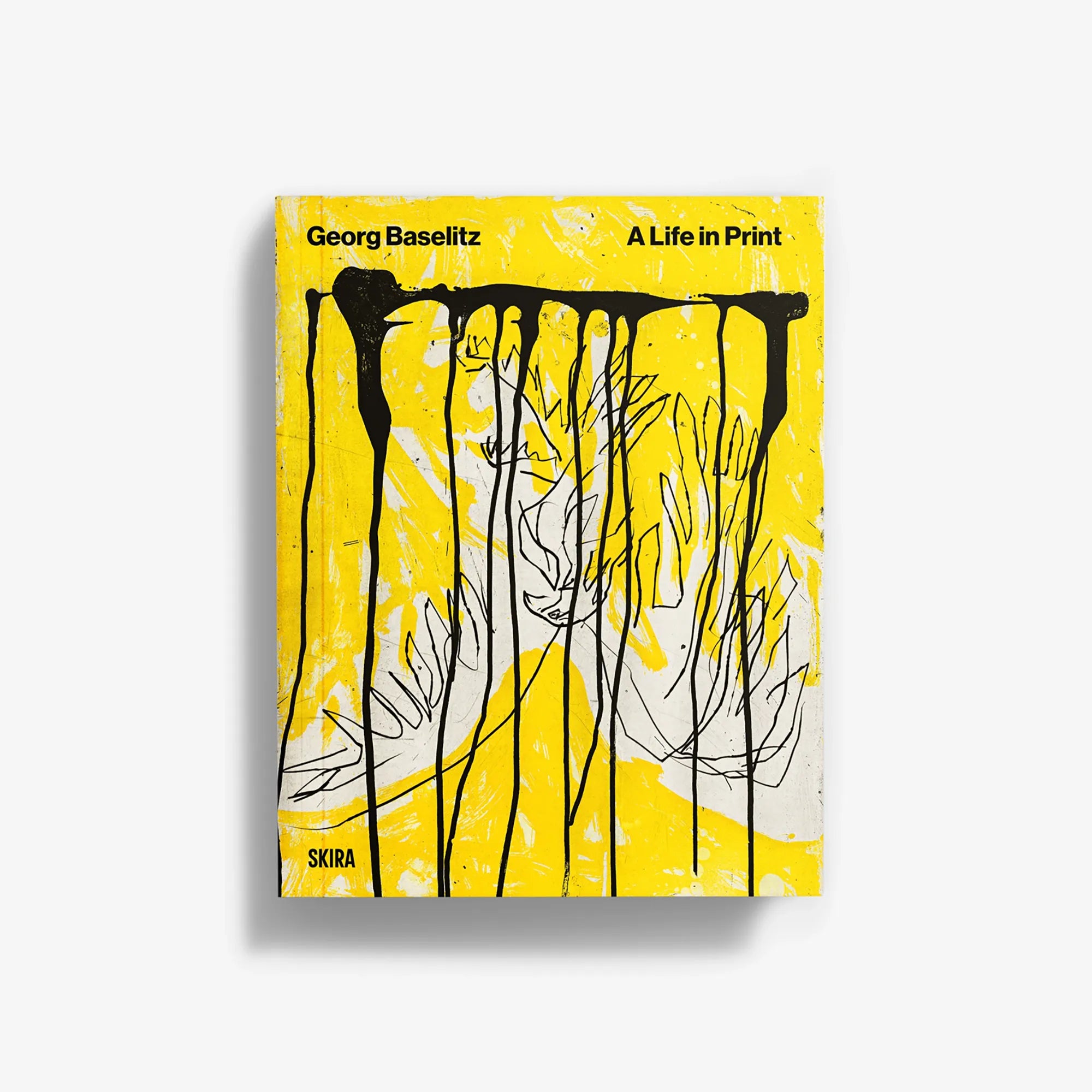 Print art book with yellow-and-black cover and abstract figure artwork
