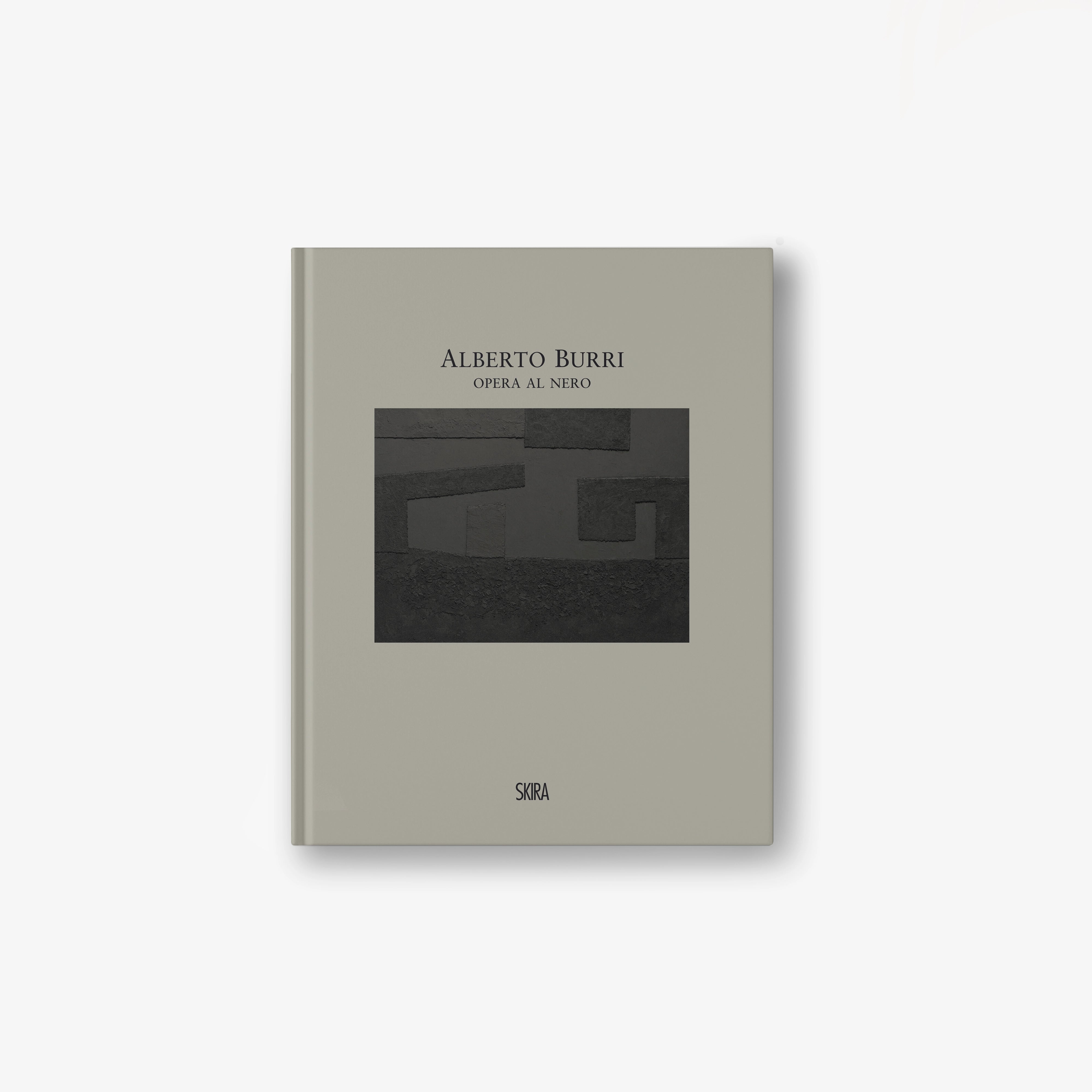 Hardcover art book, gray cover with black geometric design and text
