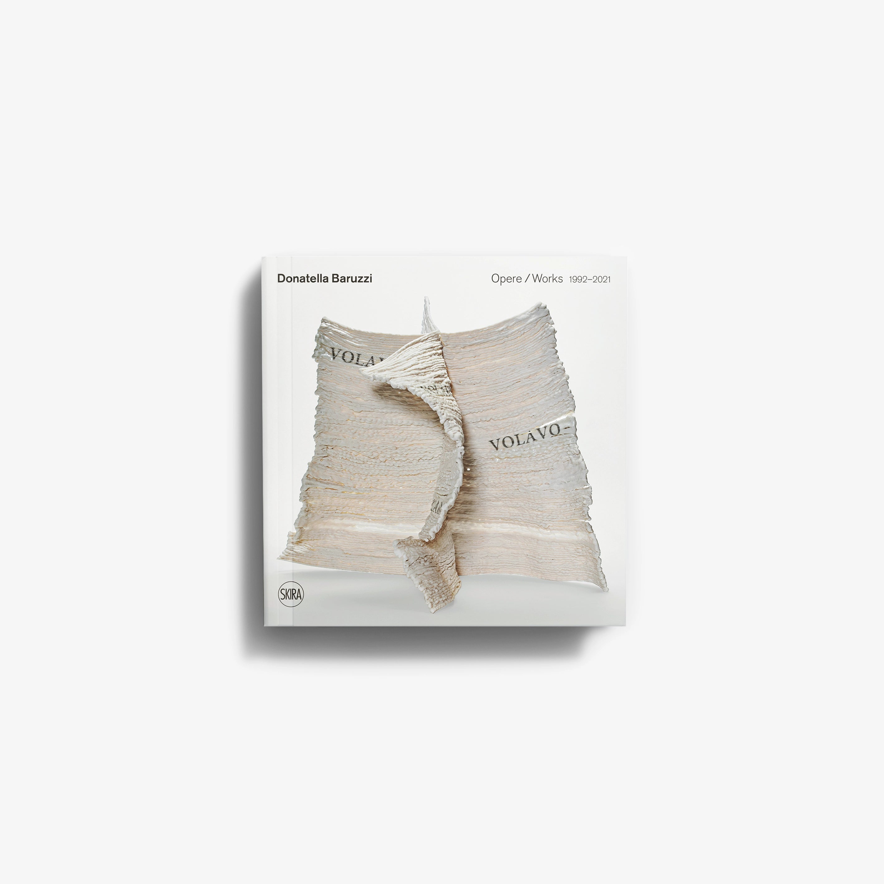 Contemporary art monograph by Skira Arte, Donatella Baruzzi, with white ceramic and terracotta elements on the cover