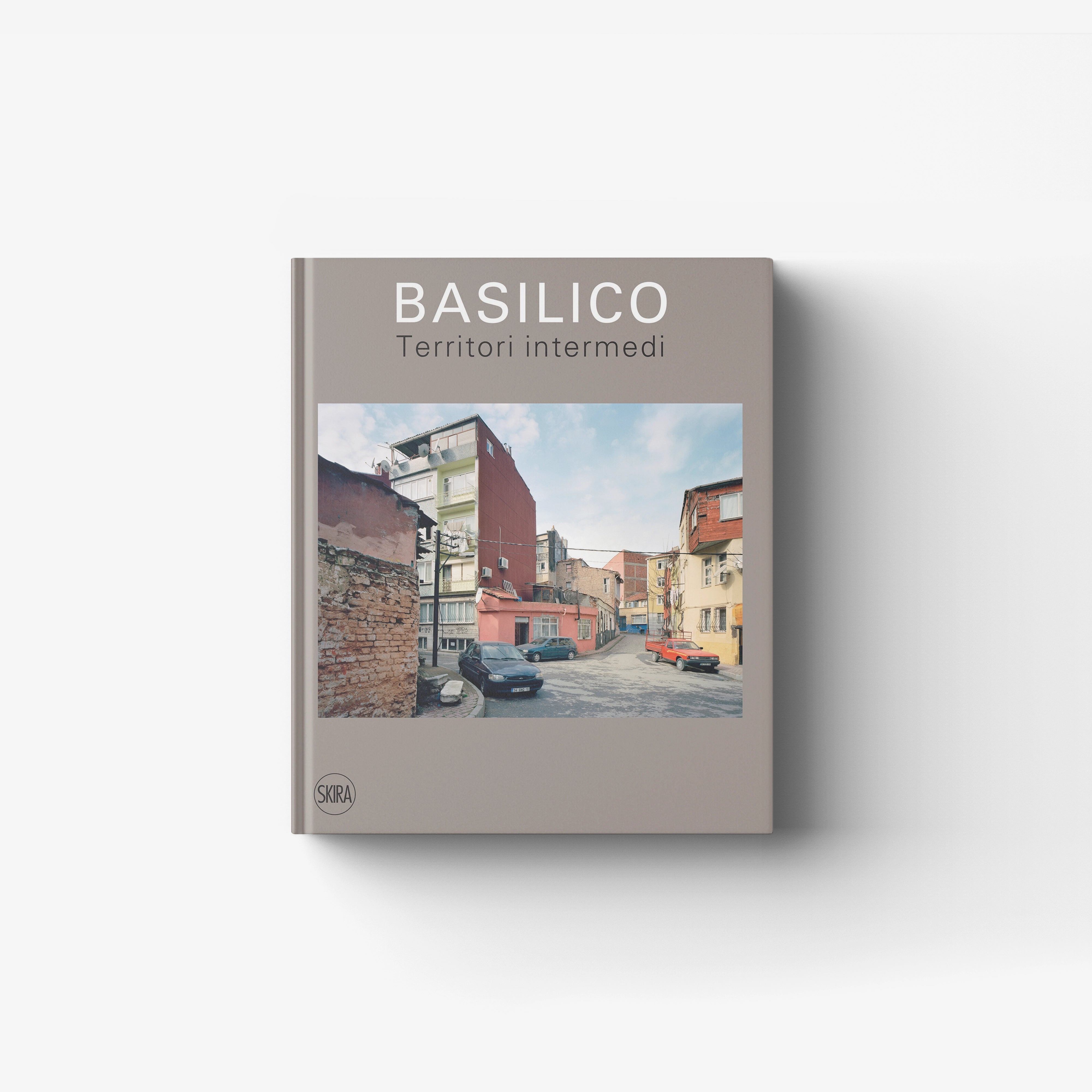 Photographic book in greige with Skira Arte branding, Basilico Territori Intermedi, featuring Gabriele Basilico photographs