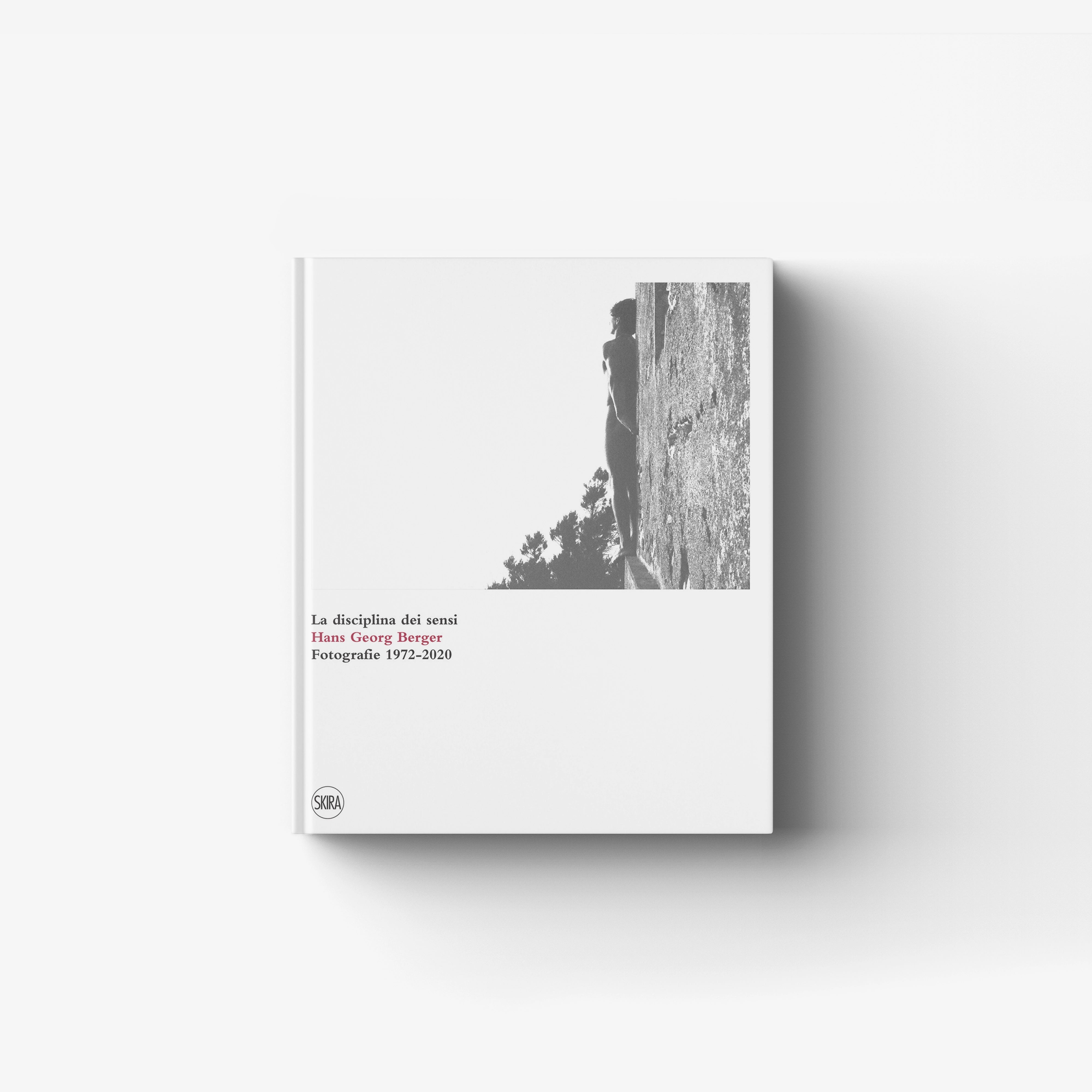 Black and white photography book by Skira Arte, with silver salt prints, showing a person beside a wall
