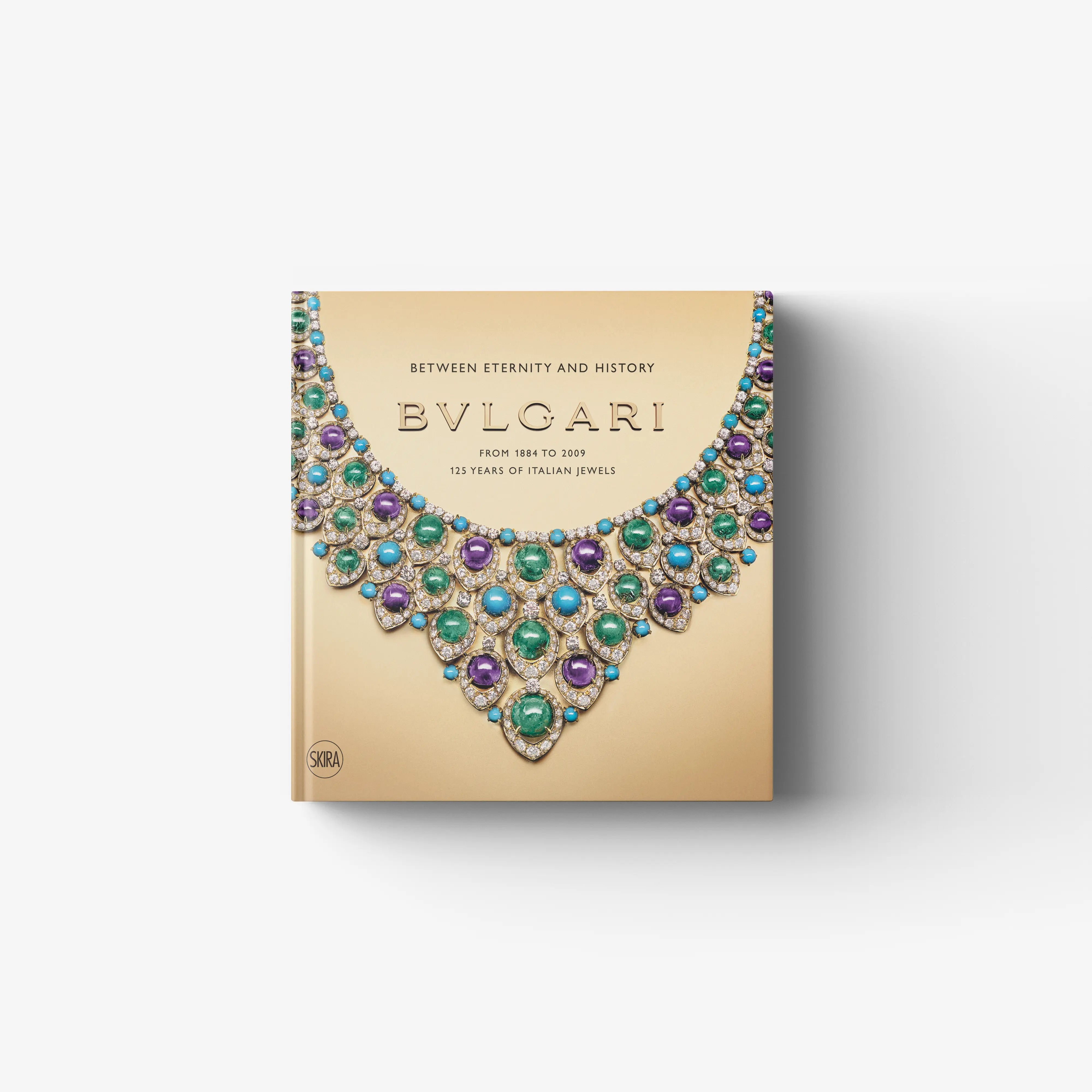 Bvlgari commemorative hardback book with jewel-toned necklace illustration on cover