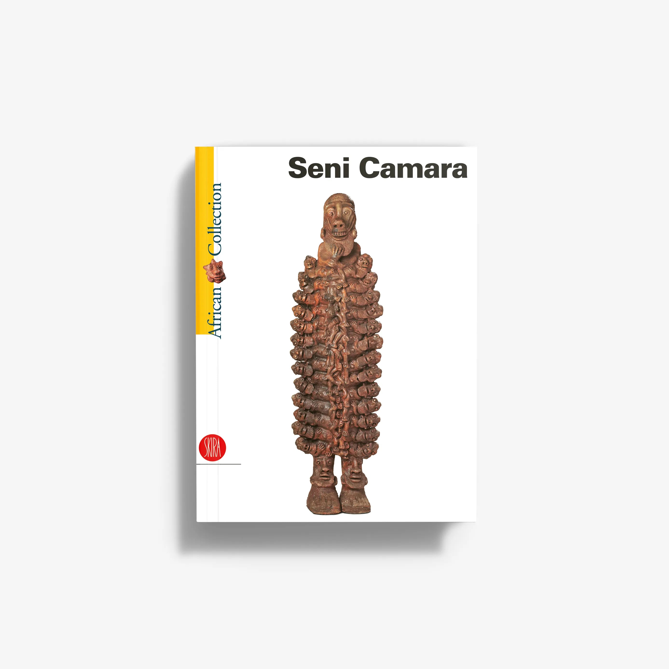 Book cover featuring standing carved figurine with brown dreadlock-like strands