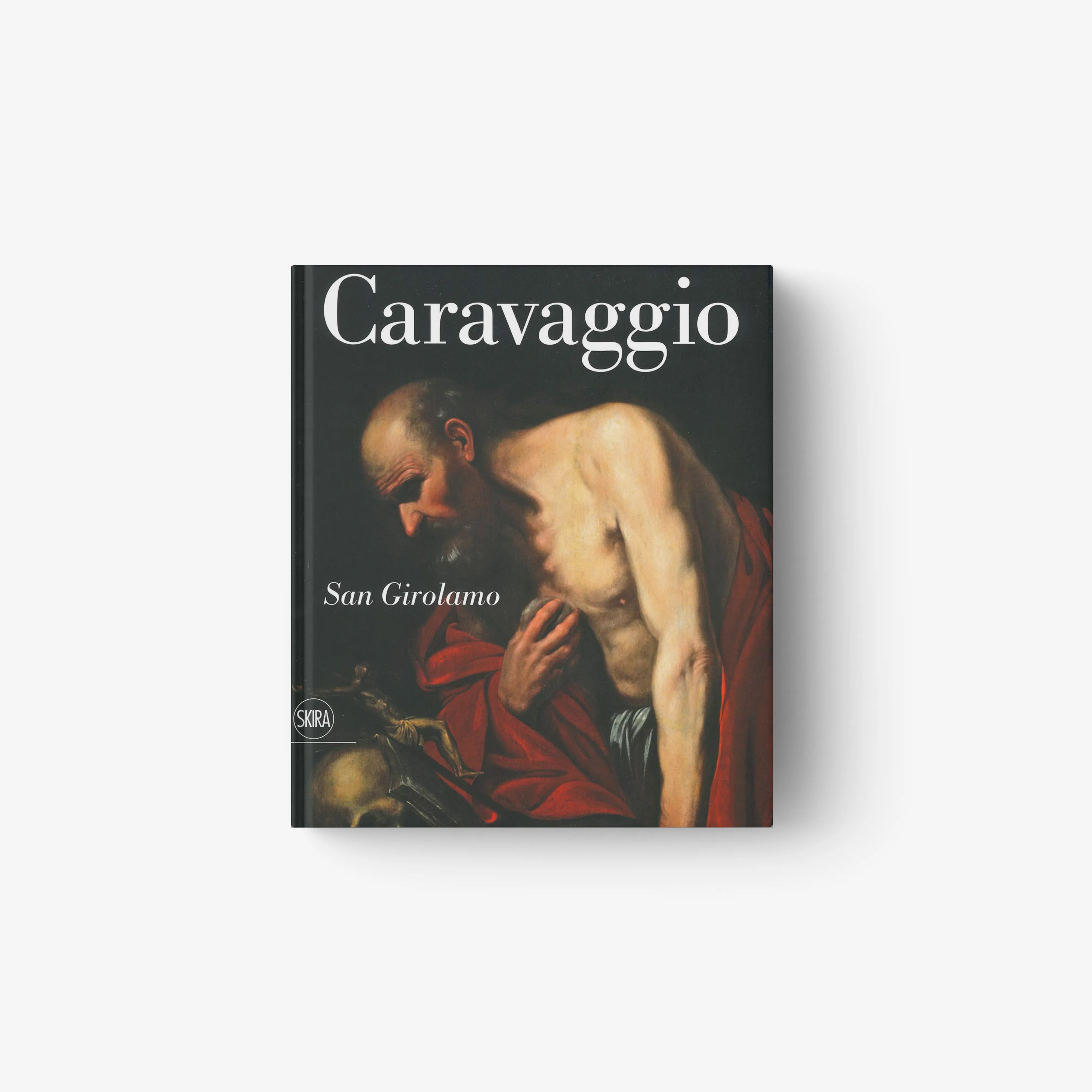 Art book in dark cover with Caravaggio painting of San Girolamo by Skira Arte, volume illustrated with painting technique details