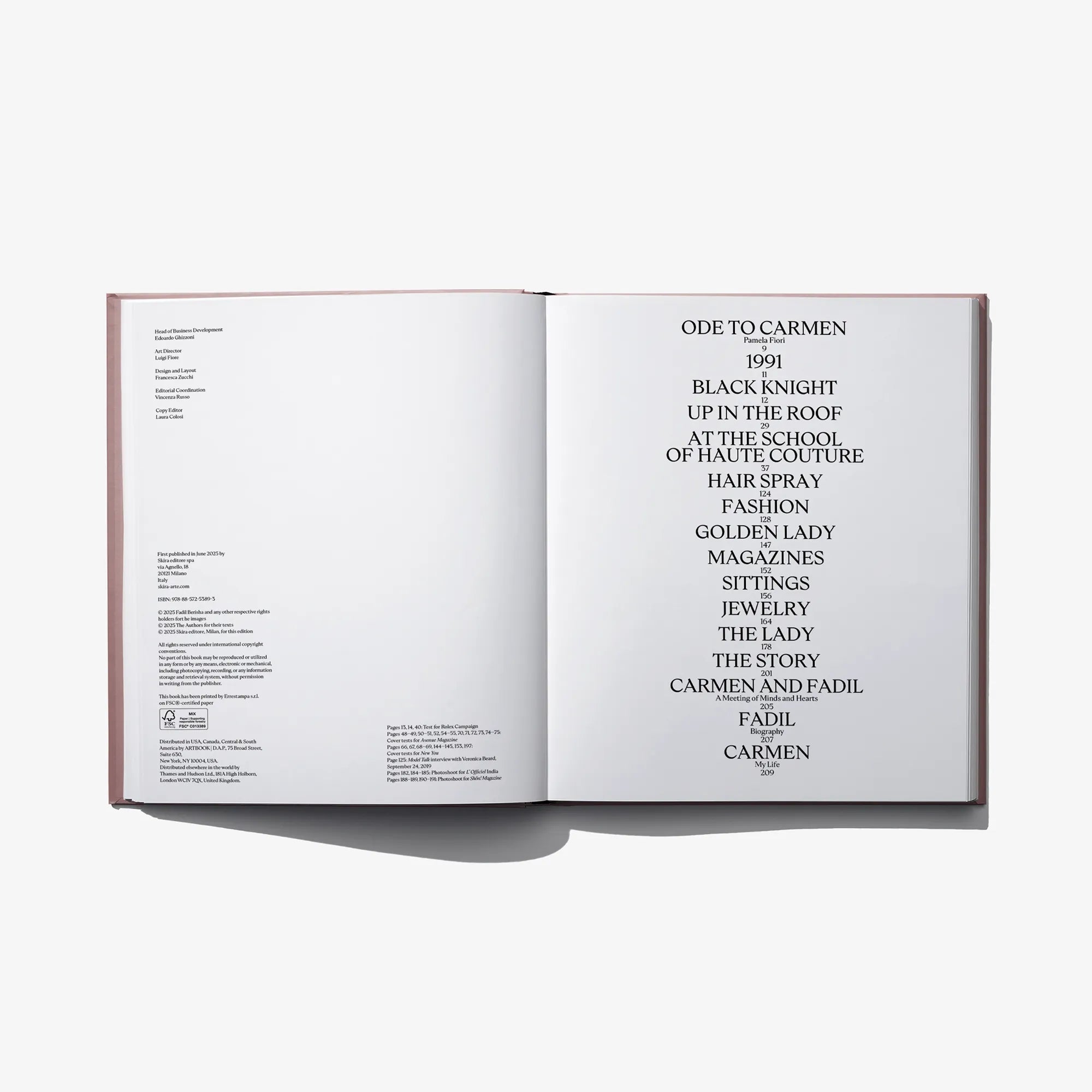 Open hardcover fashion book with typography list on right page