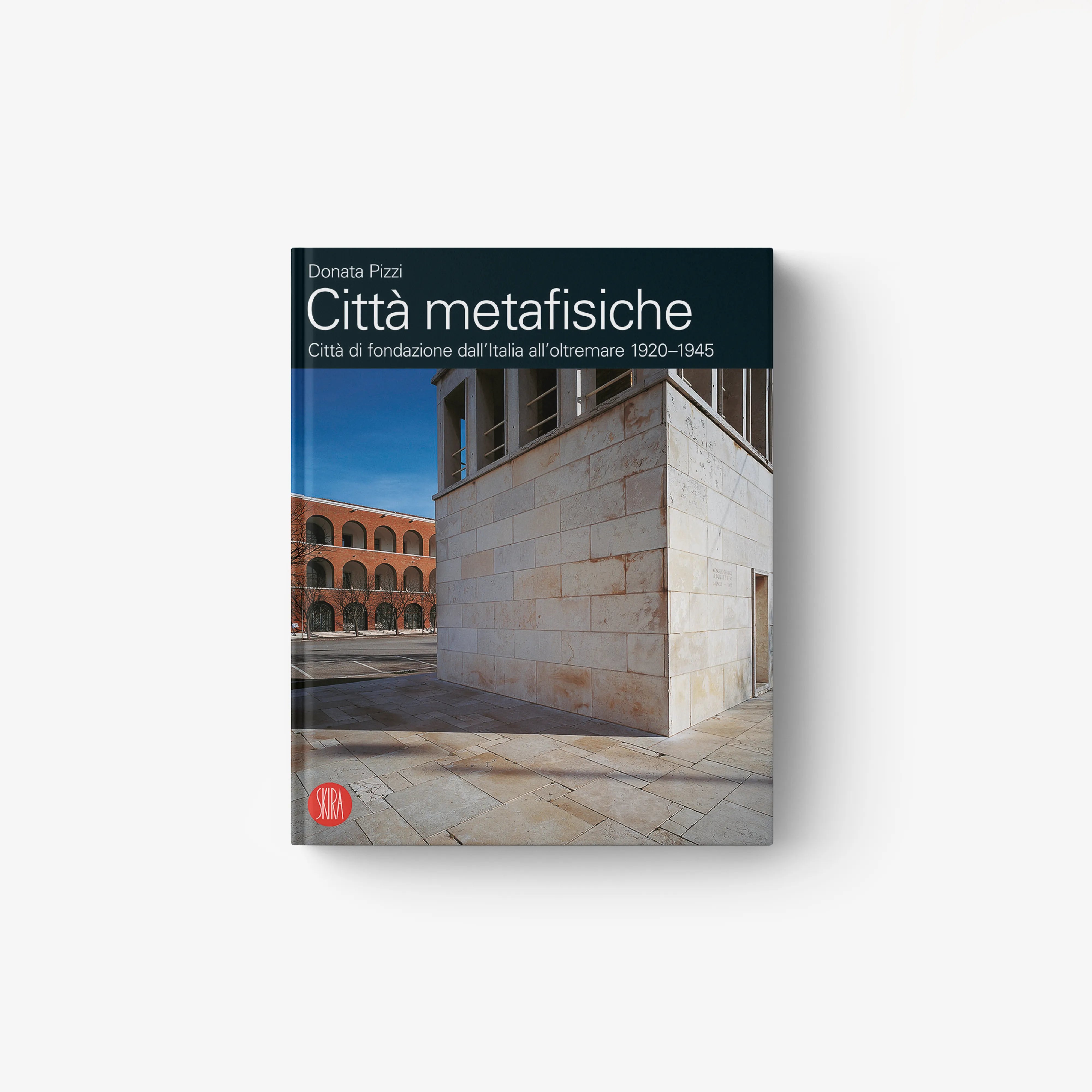 Hardcover book with teal cover and city architecture photo, title Metaphysical Cities (1920–1945).