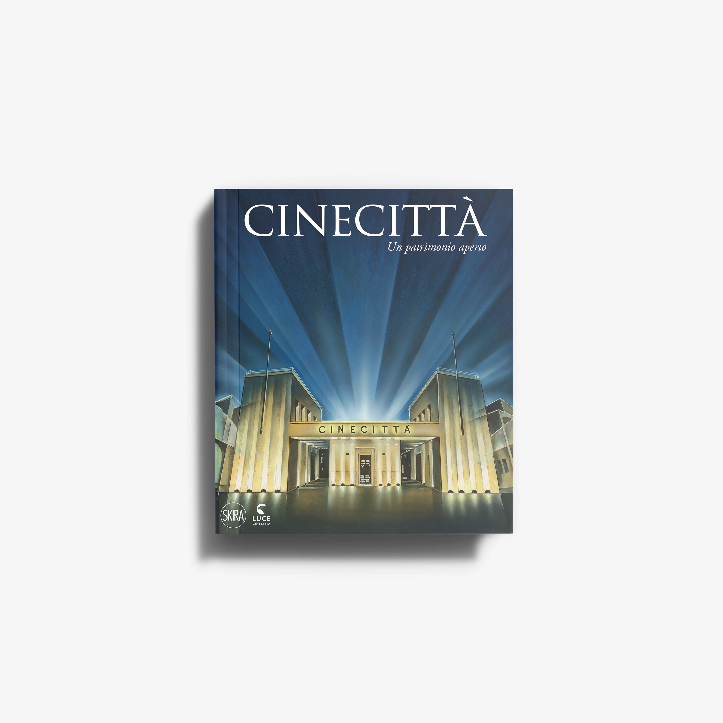 Photographic book in blue with Skira Arte branding, Cinecittà si Mostra permanent exhibition cover design