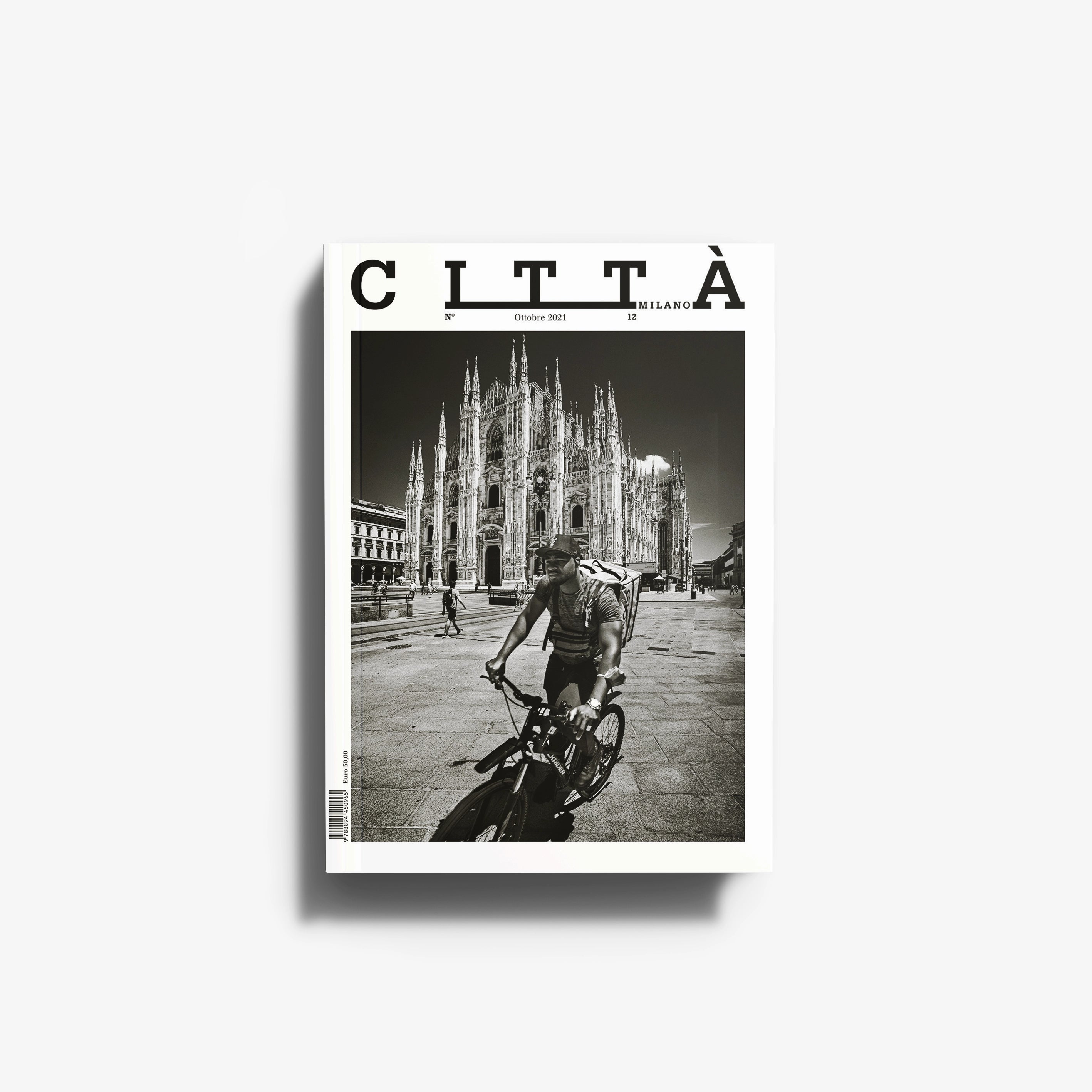 Photographic book by Skira Arte in black and white, hardback cover, featuring Milan cathedral and a cyclist