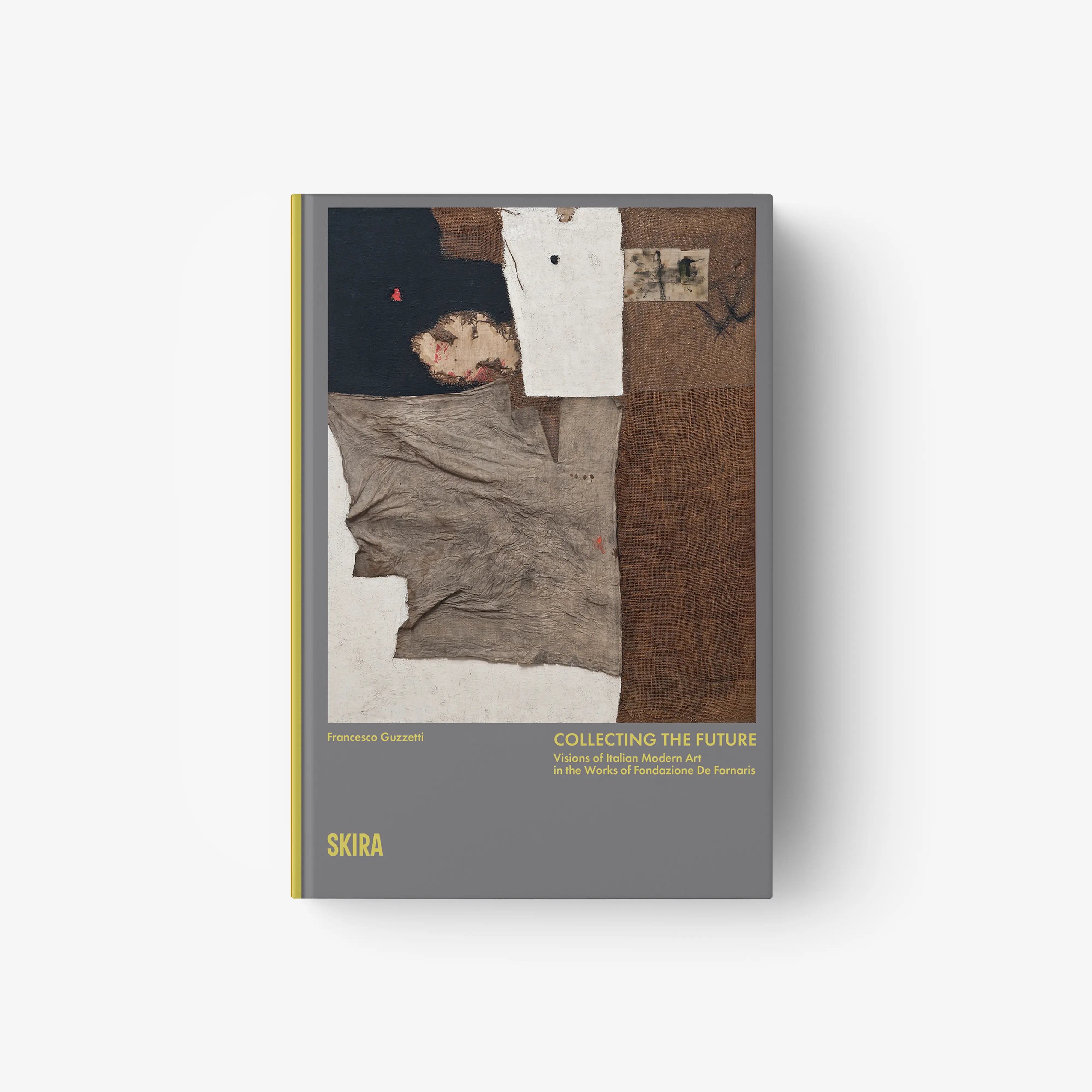 Hardcover art book with abstract collage cover, dark and beige papers, gray title panel