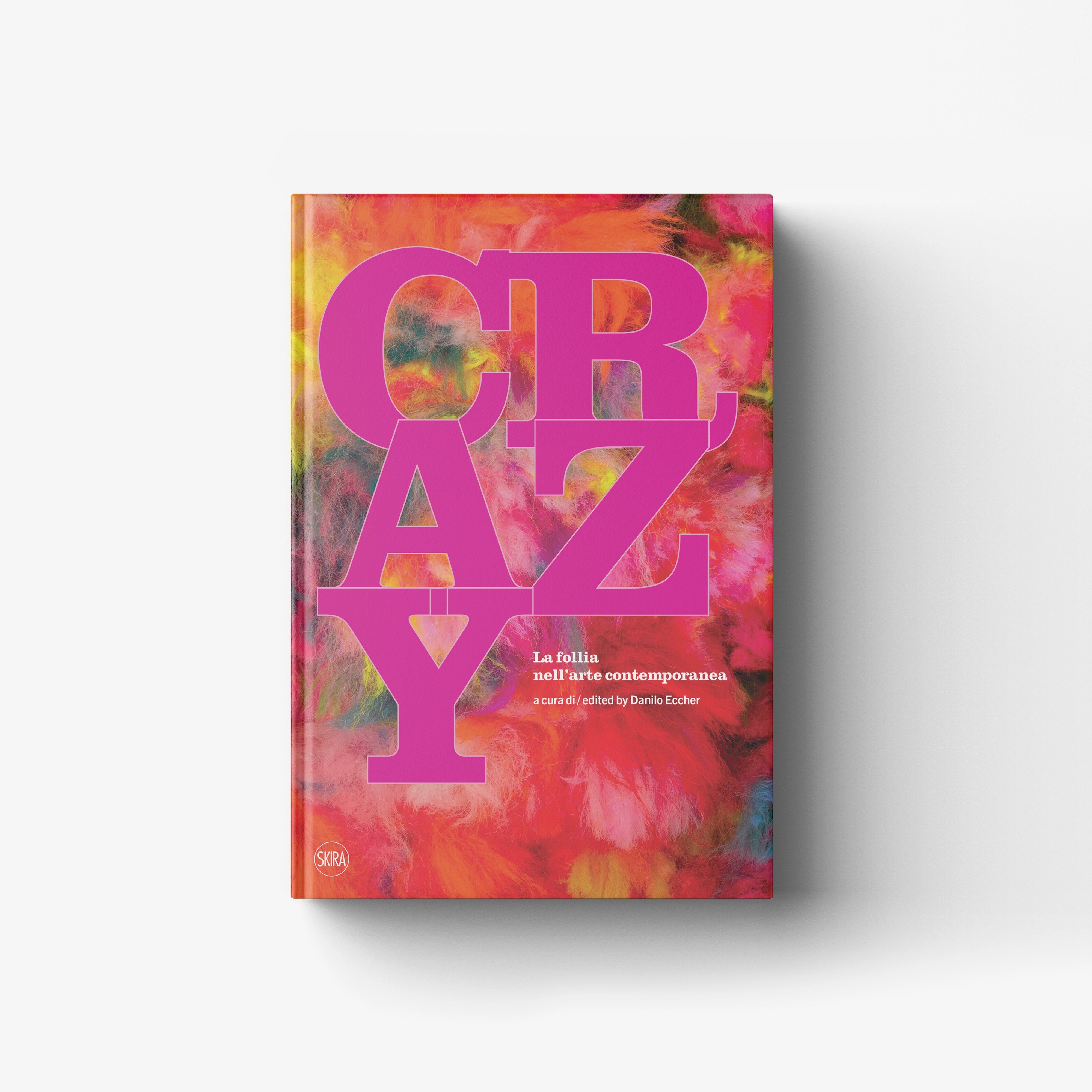 Contemporary art book by Skira Arte in bright pink with immersive site-specific installations, featuring the word Crazy