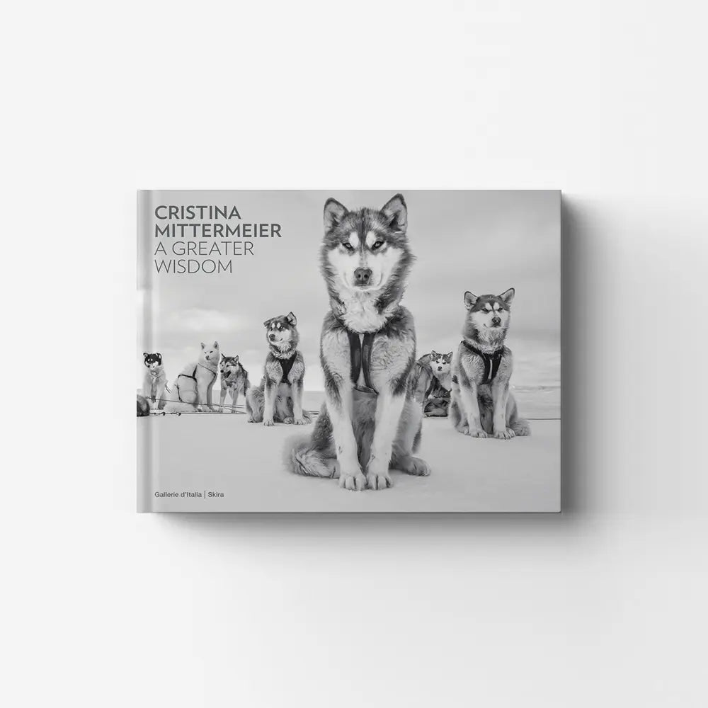 Hardcover photo book by Skira Arte featuring Cristina Mittermeier, with 90 photographs and black and white dog portraits