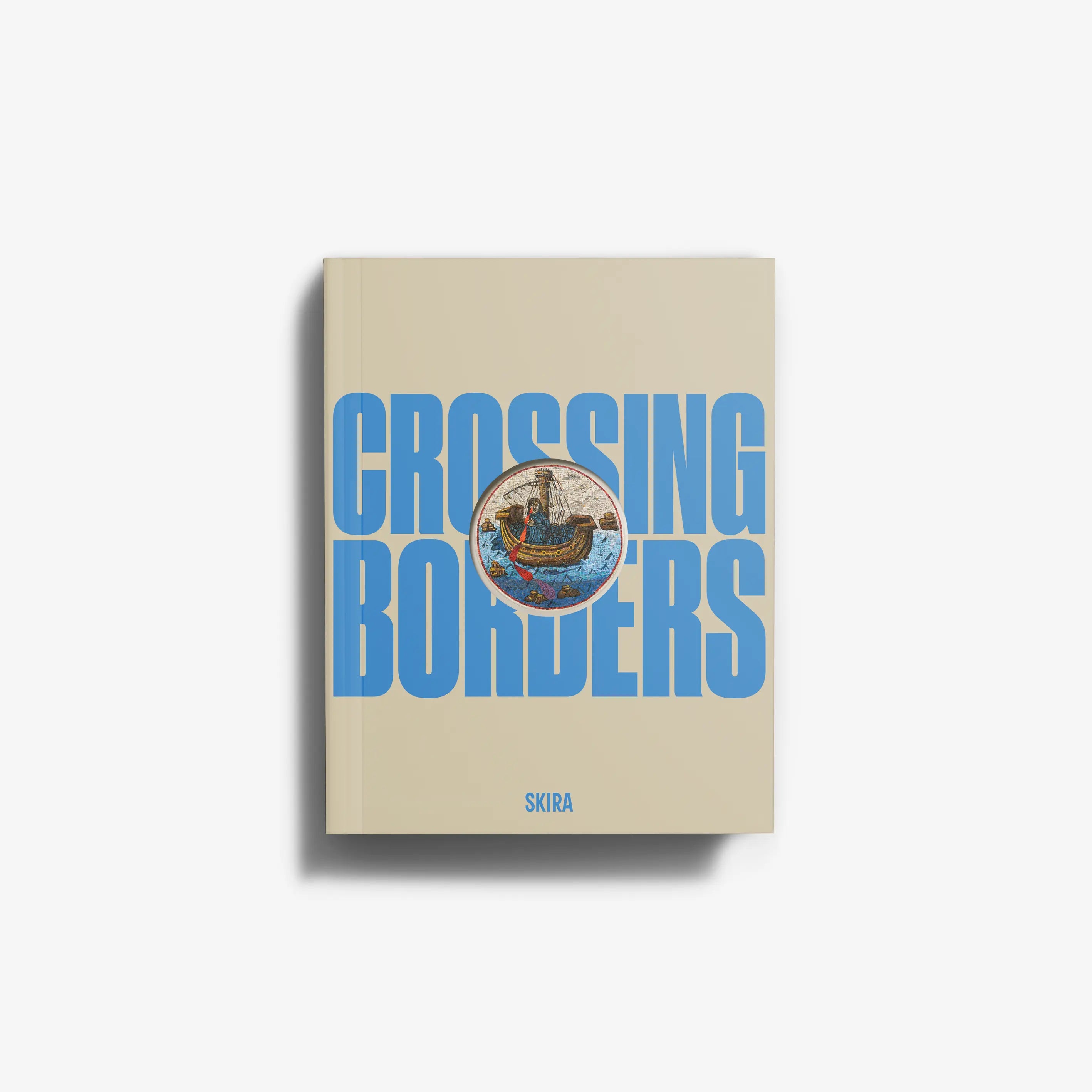 Beige book with blue title and circular illustrated emblem on the cover, SKIRA.