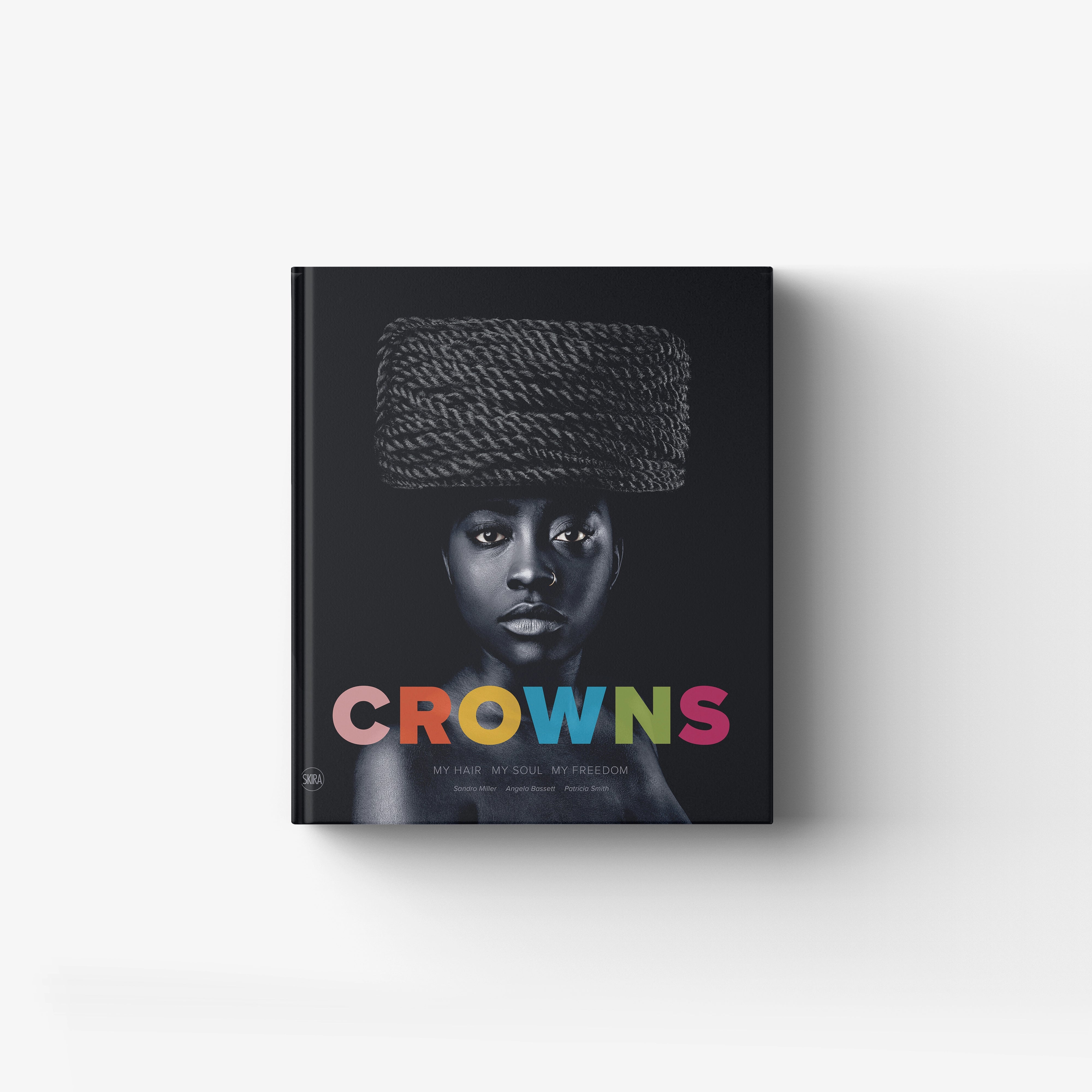 Art book by Skira Arte in dark tones, featuring a photographic portrait with a themed hair and identity project
