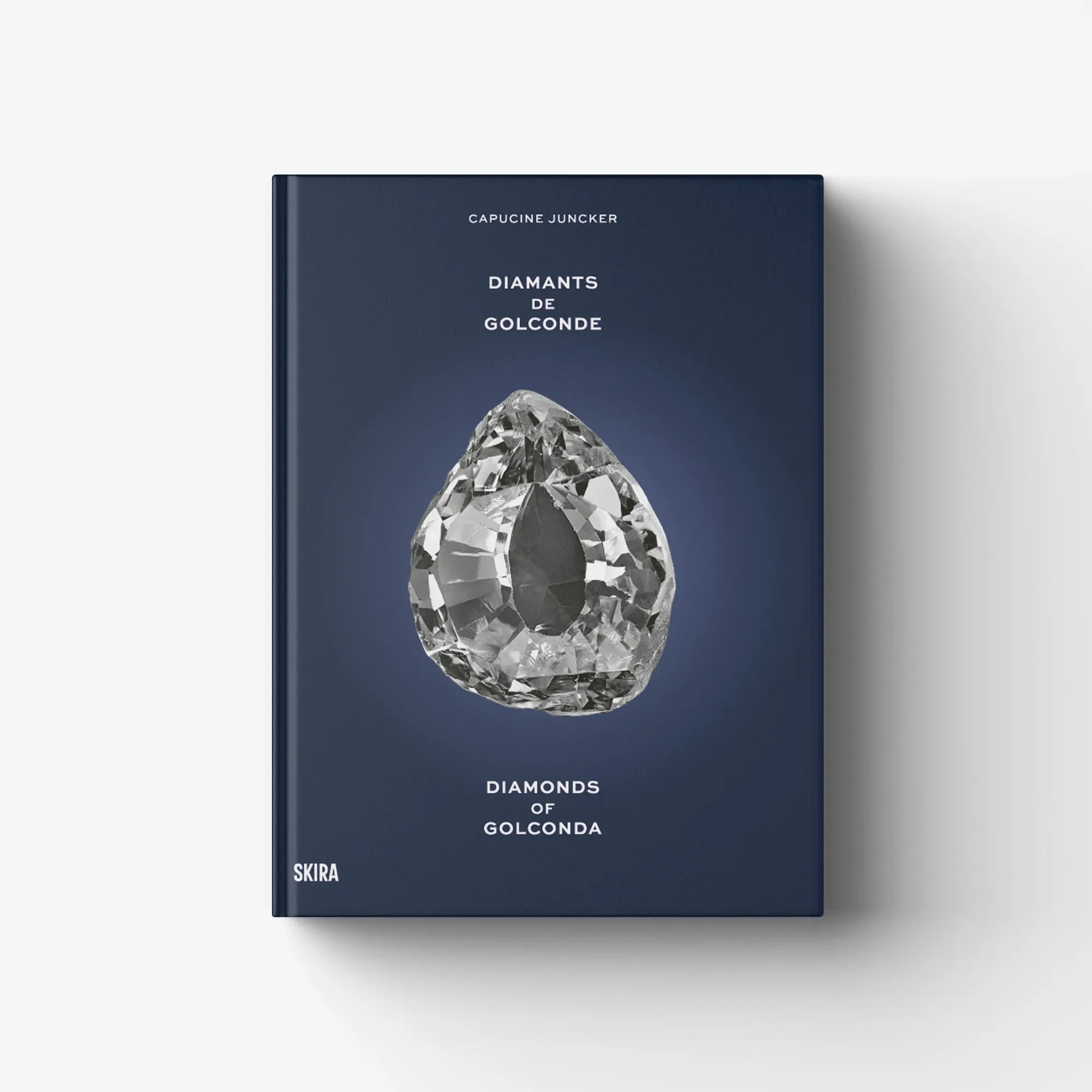 Diamonds of Golconda book with dark blue cover and faceted diamond graphic