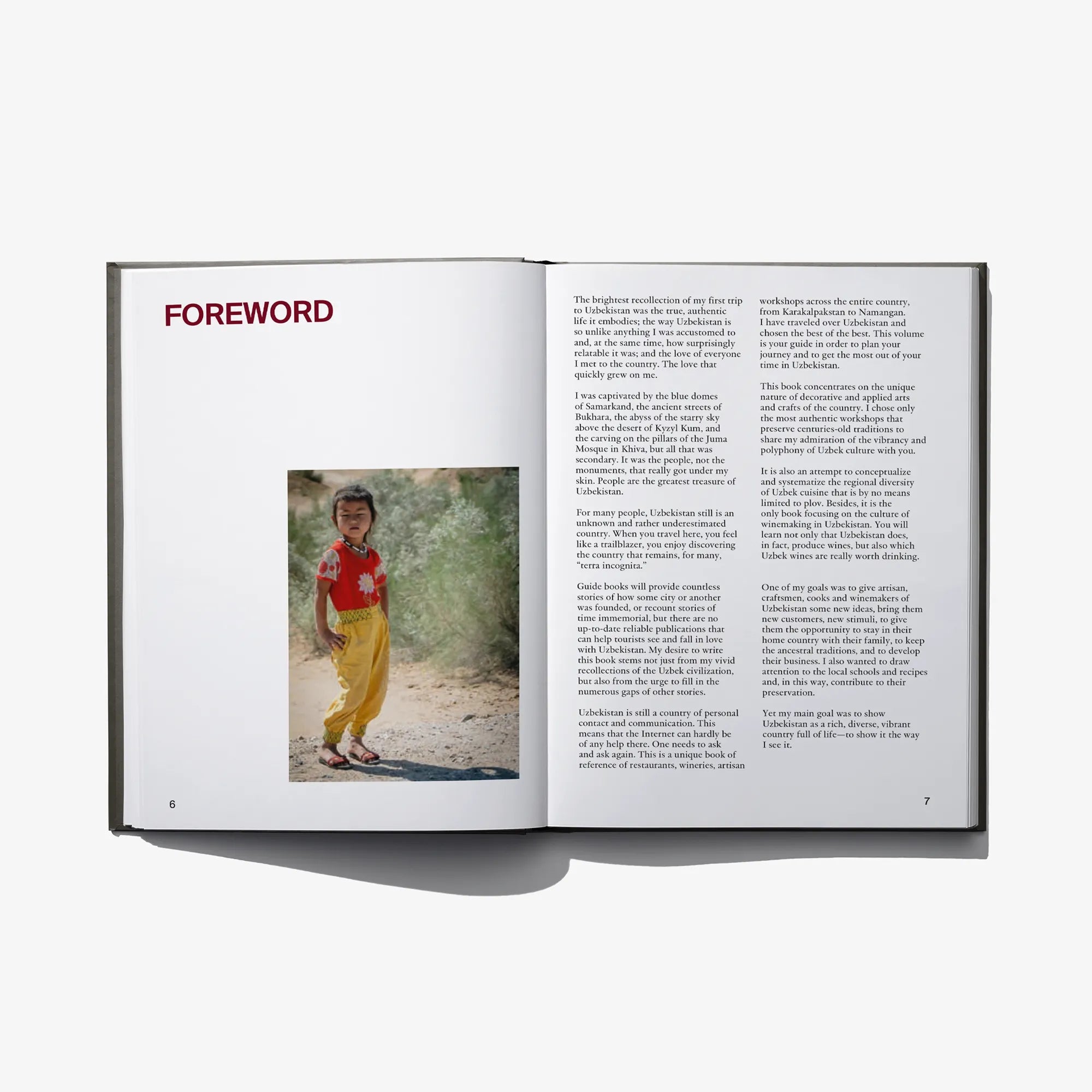 Open hardcover book spread with heading 'FOREWORD' and portrait photo on the left