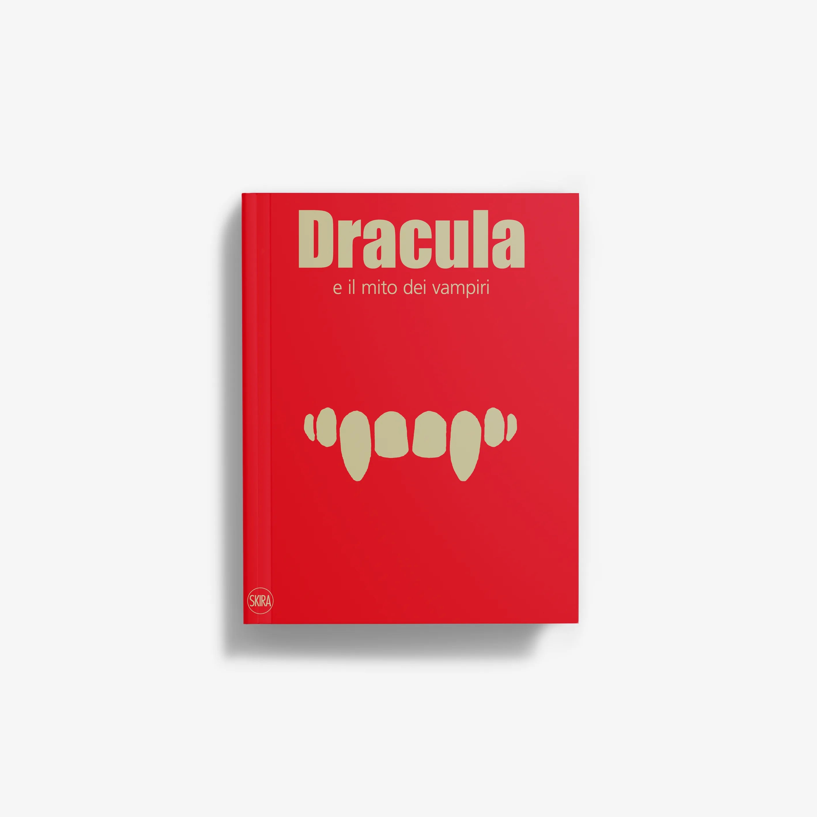 Red Dracula book with vampire-tooth graphic on cover