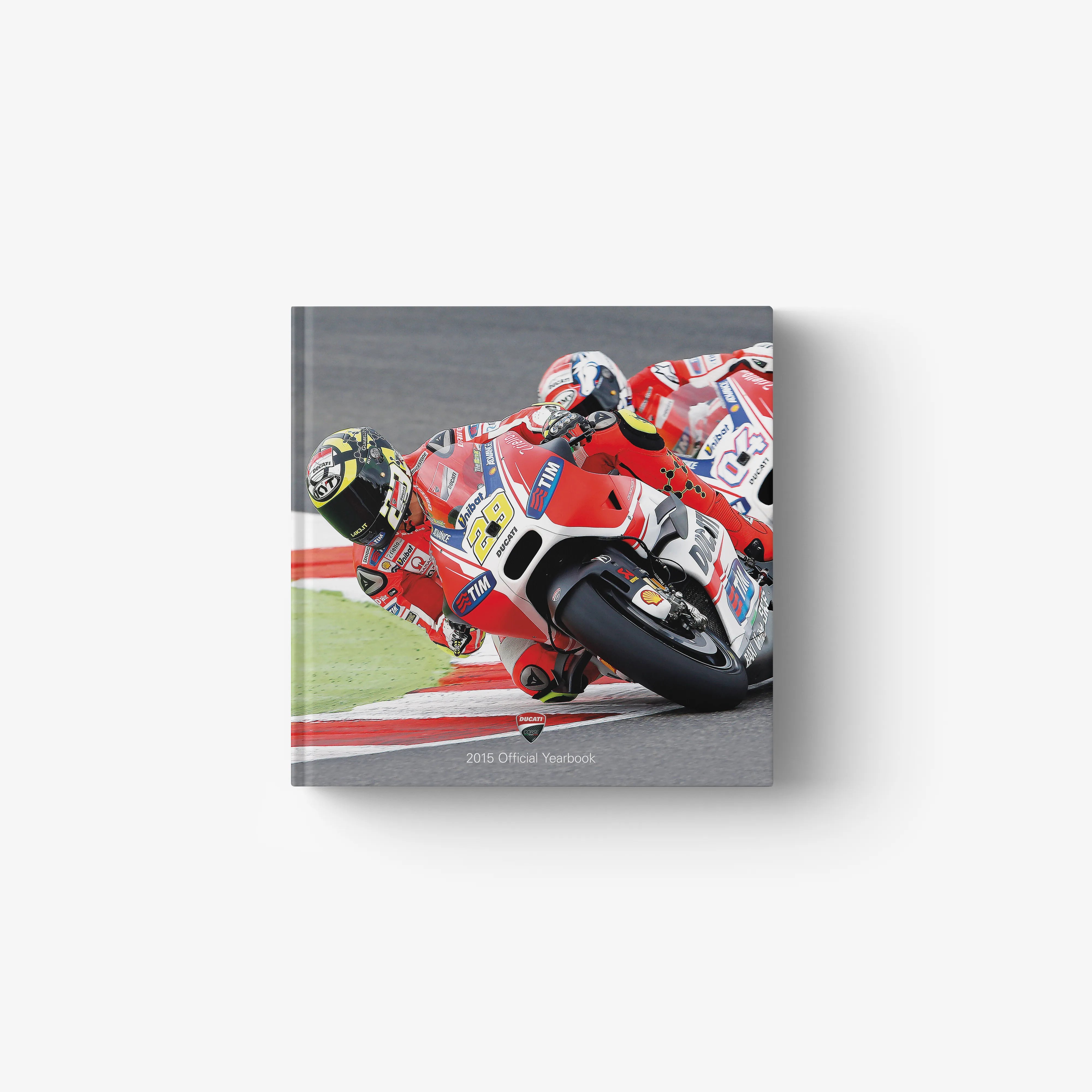 2015 Ducati Corse official yearbook with racebike cover art, red and white.