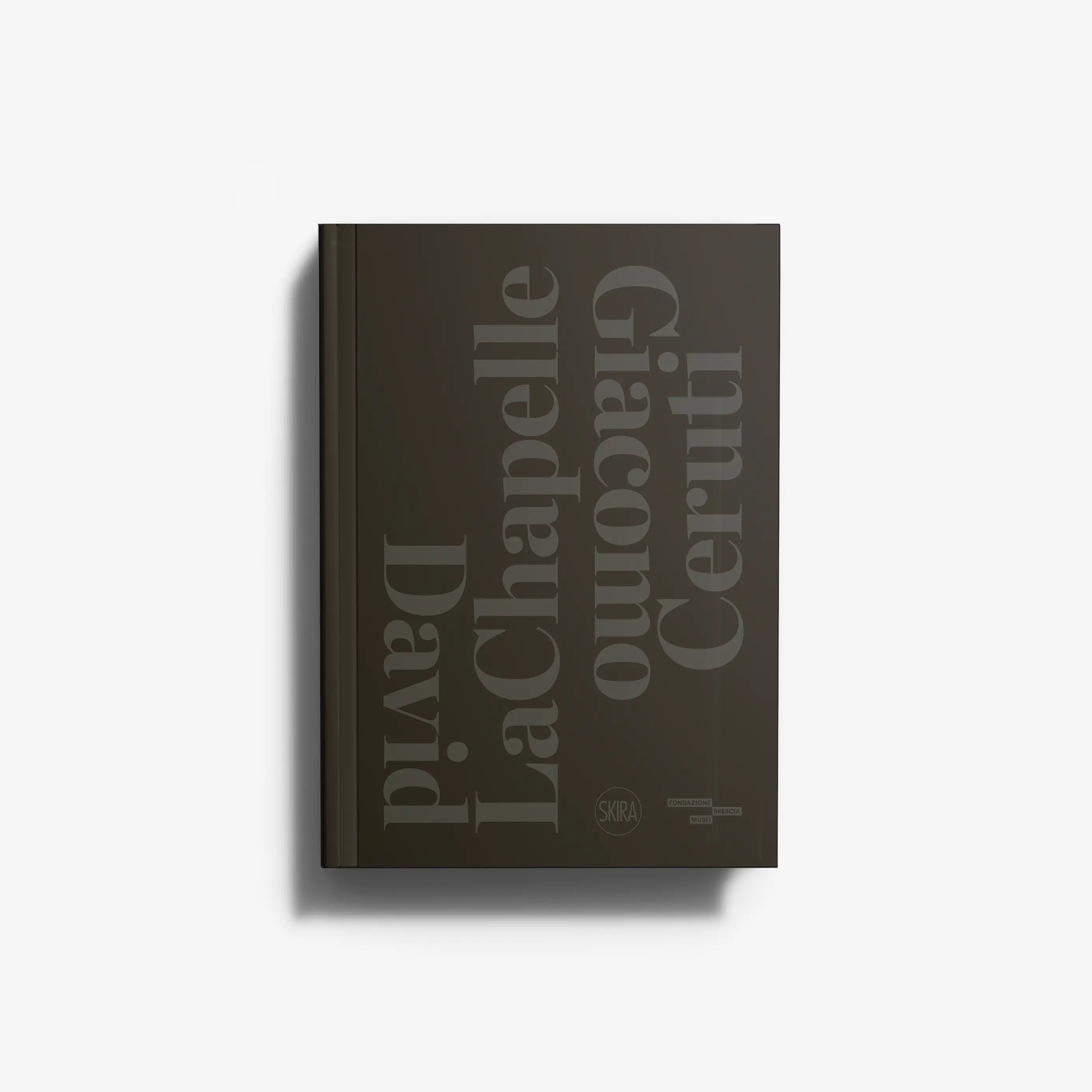 Contemporary photography book in dark brown with large typographic text, Skira Arte, tendopoli di senzatetto davanti al LACMA