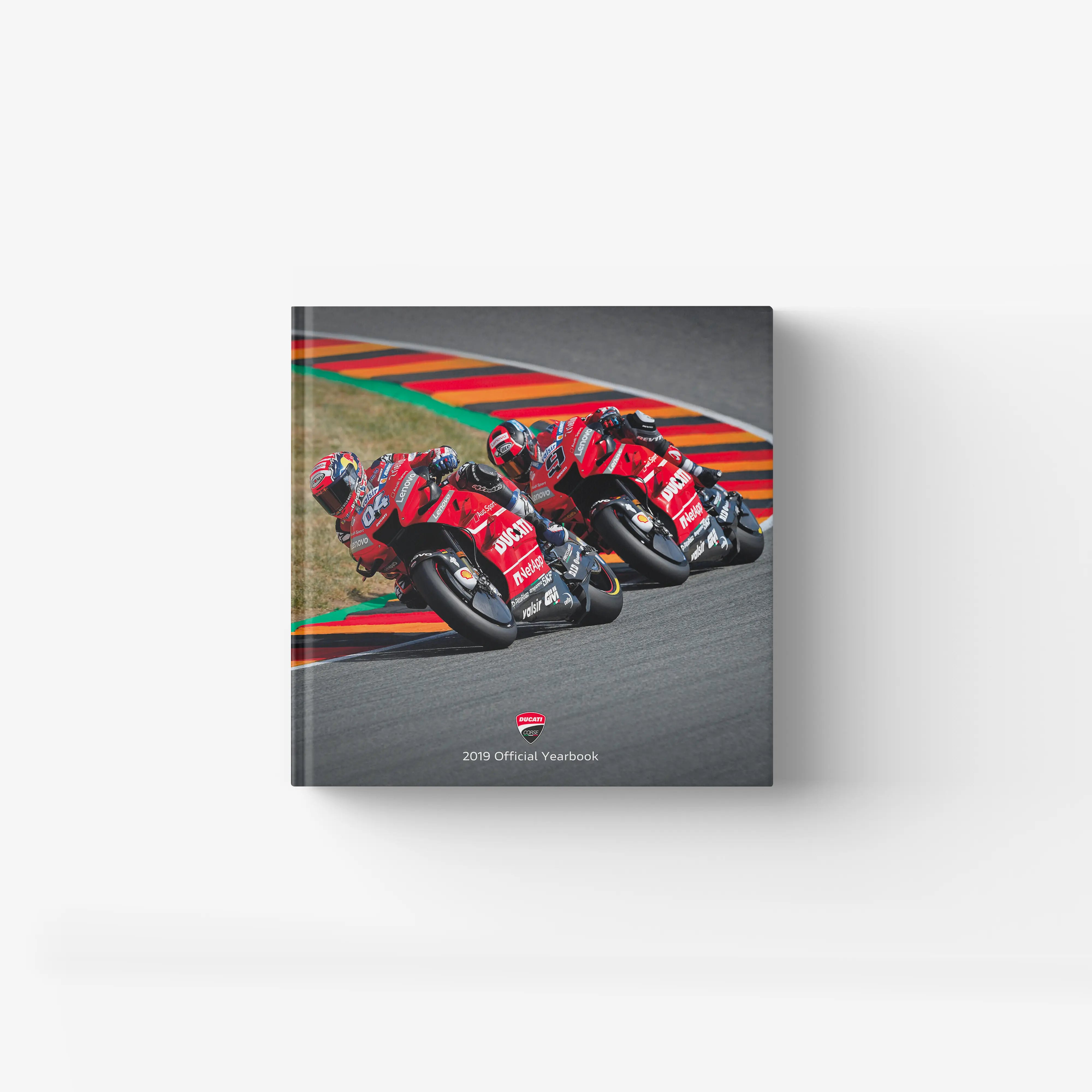 Motoring yearbook Ducati Corse 2019 by Skira Arte, hardback photo book with red and black racing bikes