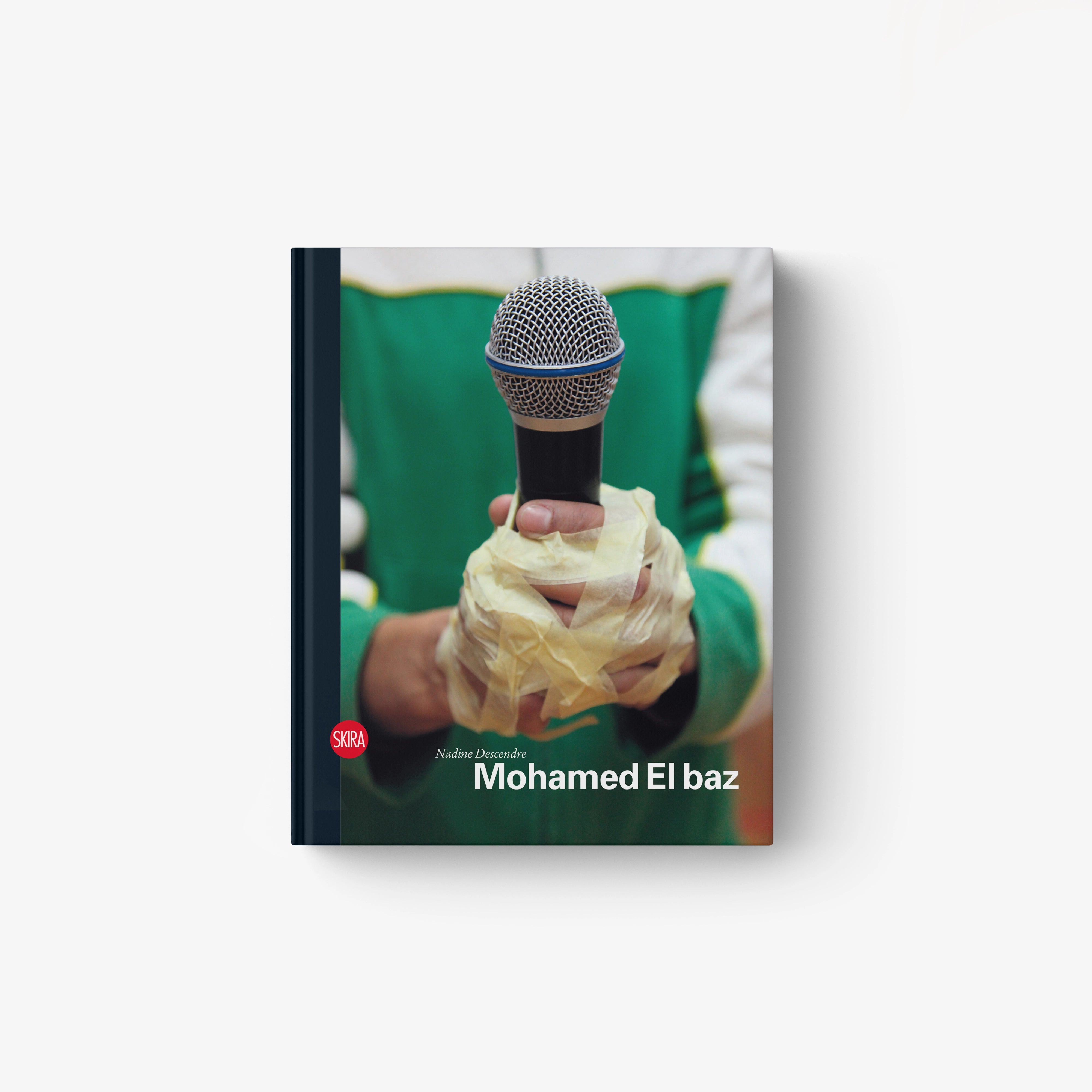Cover art featuring a handheld microphone held by hands