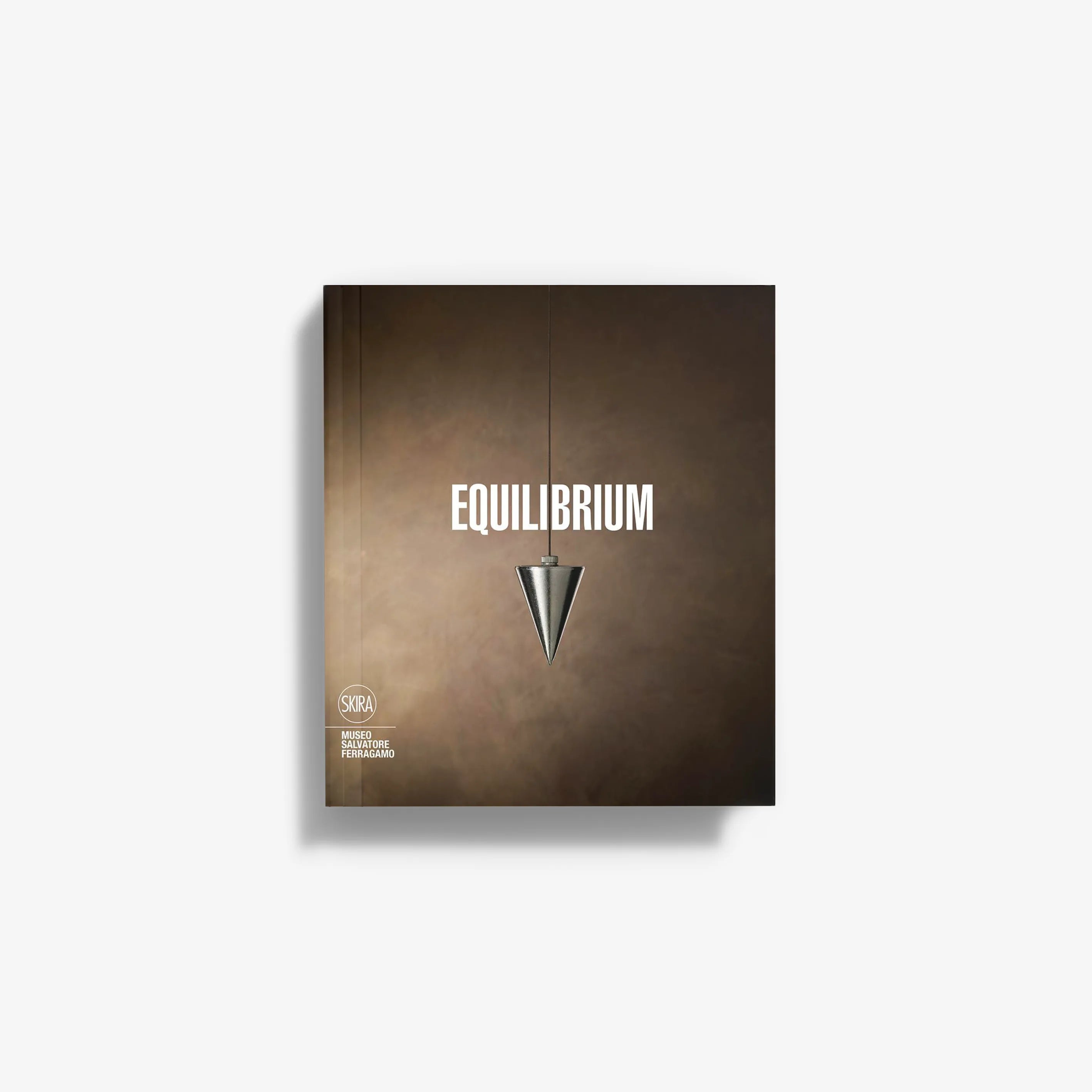 Equilibrium book, Italian edition, dark cover with centered title text