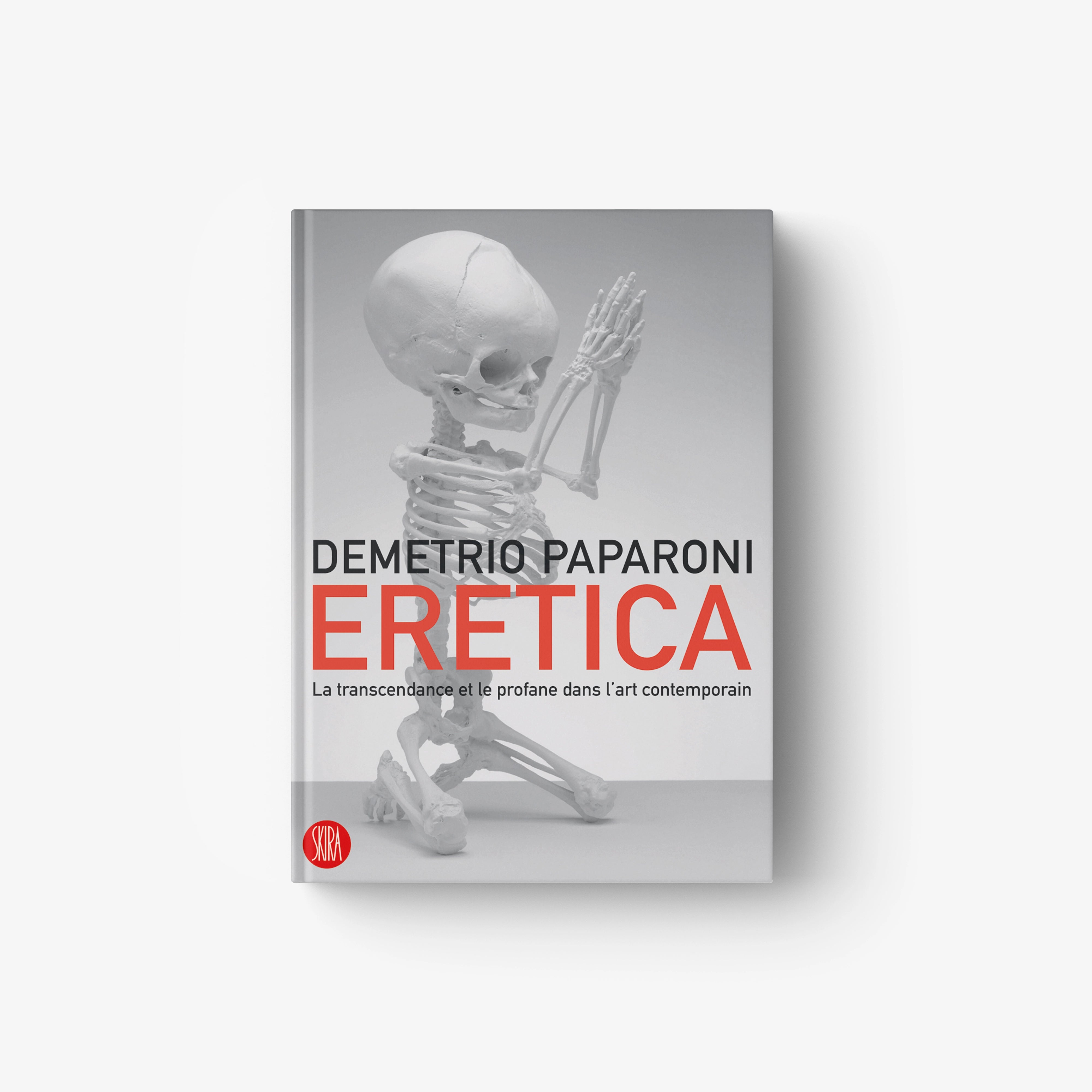 Eretica French-language book with skeleton hand cover art, red title on gray