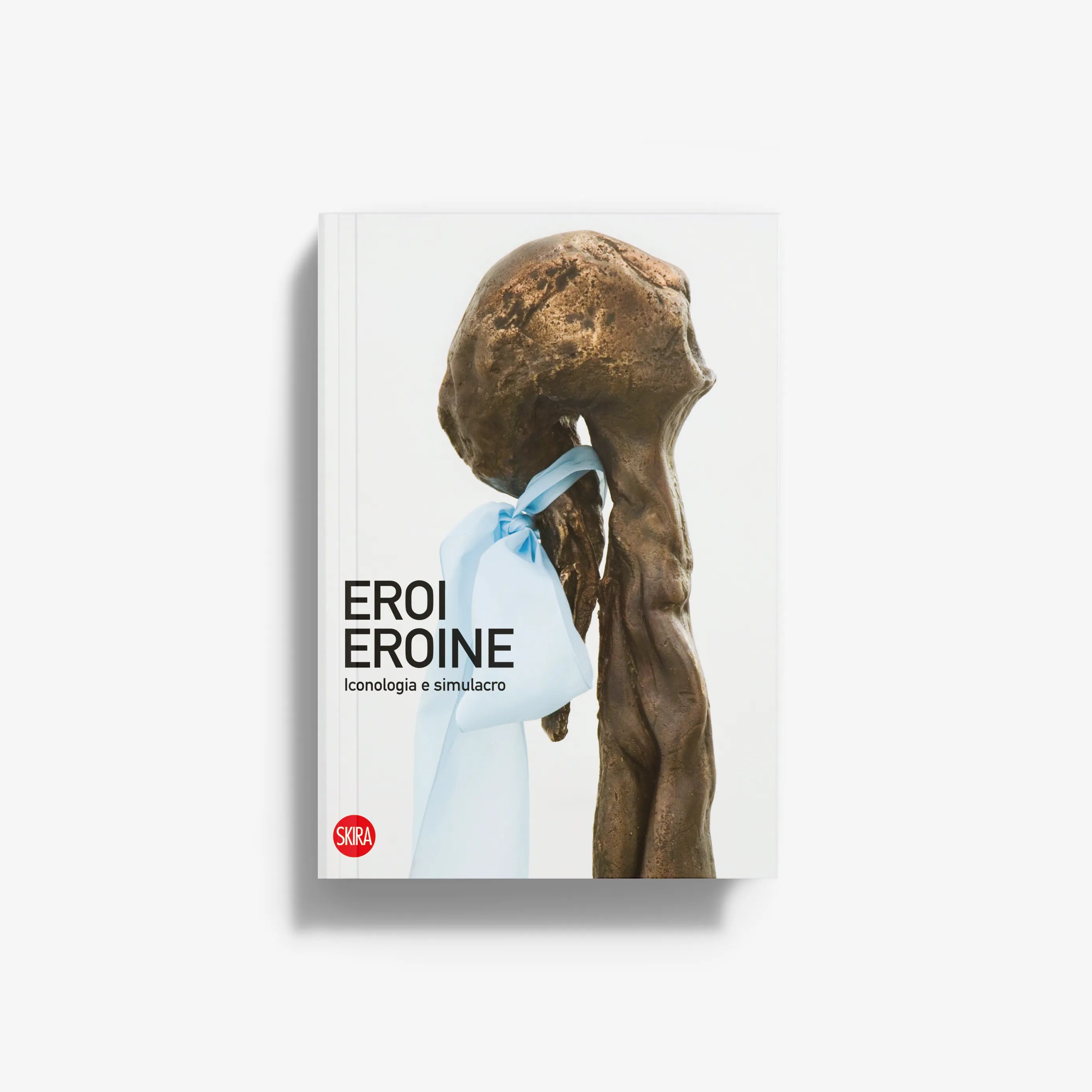 Hardcover book cover with bronze statue head and blue ribbon detail