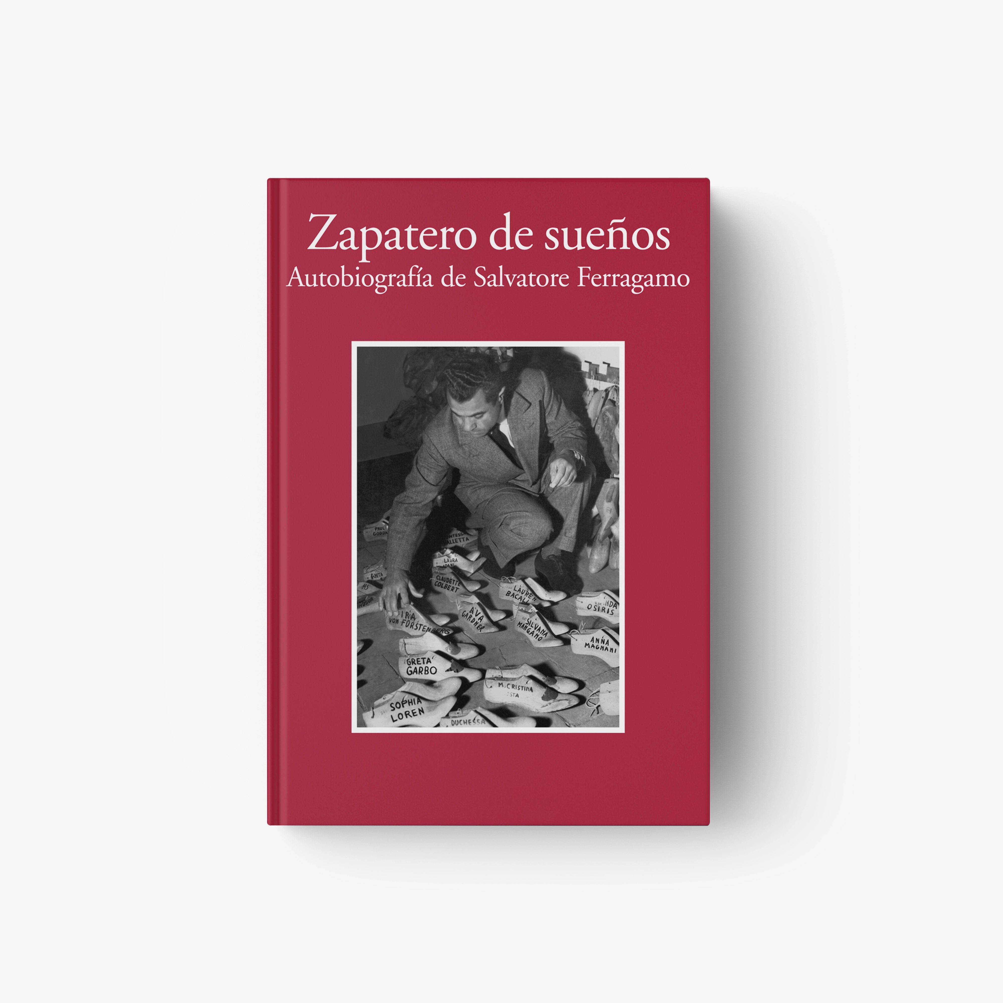 Red hardcover autobiography book with title text and black-and-white portrait photo