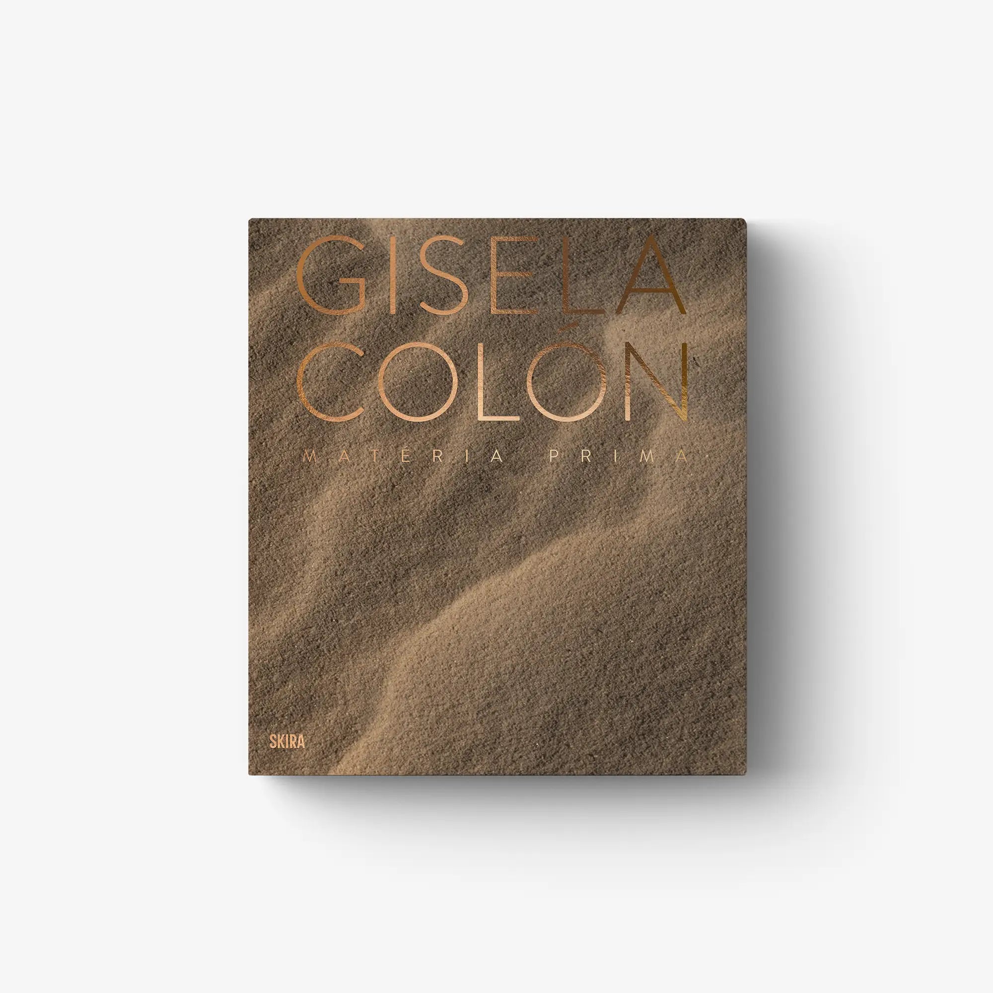Brown hardcover art book cover with orange lettering, single volume