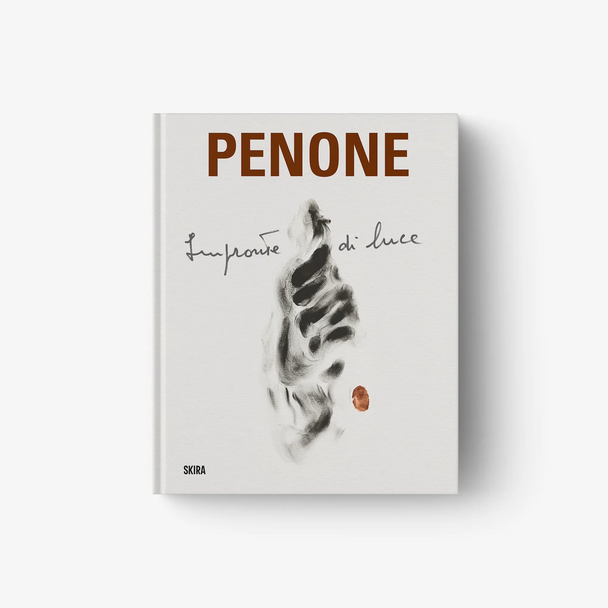Art book with white cover, PENONE title and abstract gray handprint artwork