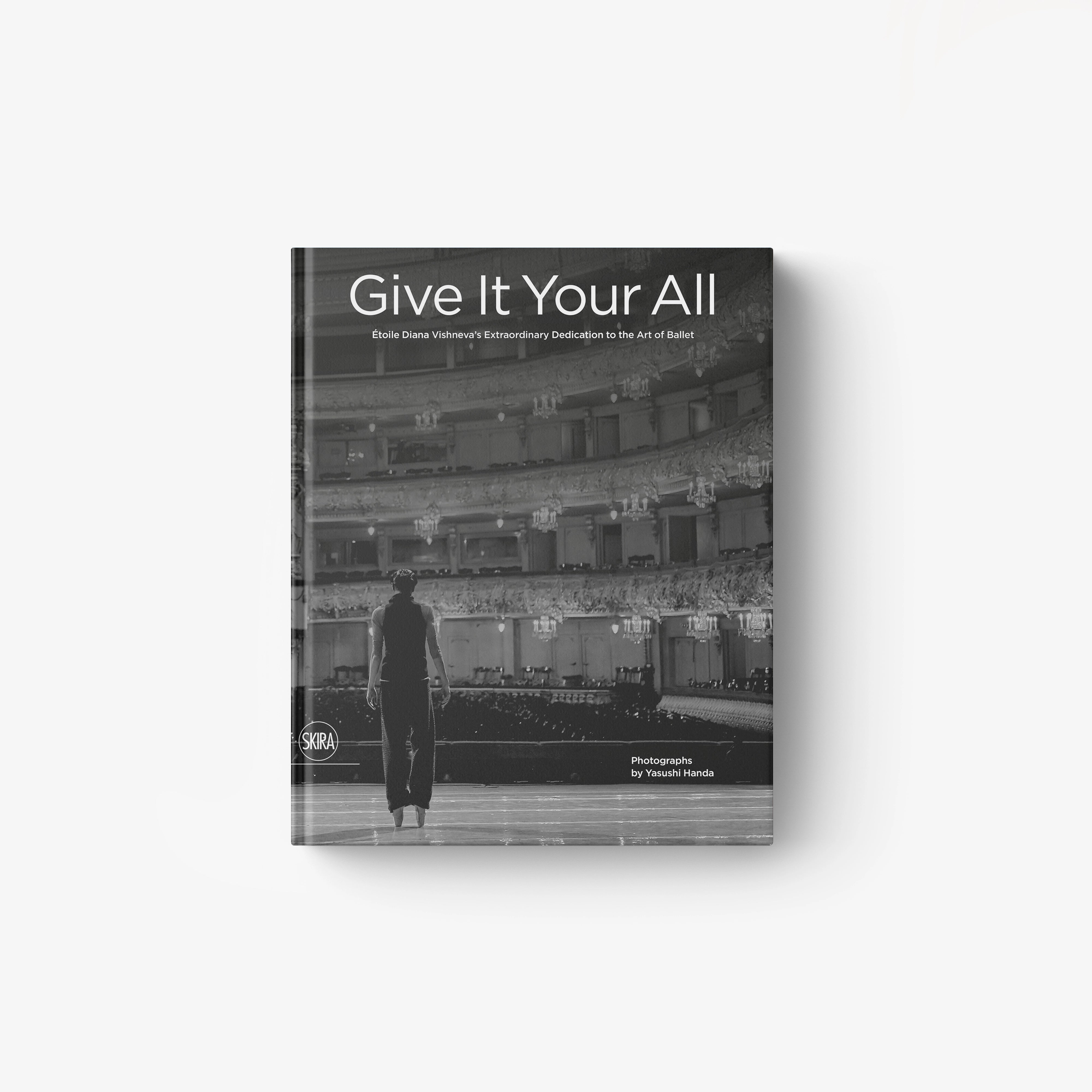 Hardcover art book with grayscale stage photo cover and title
