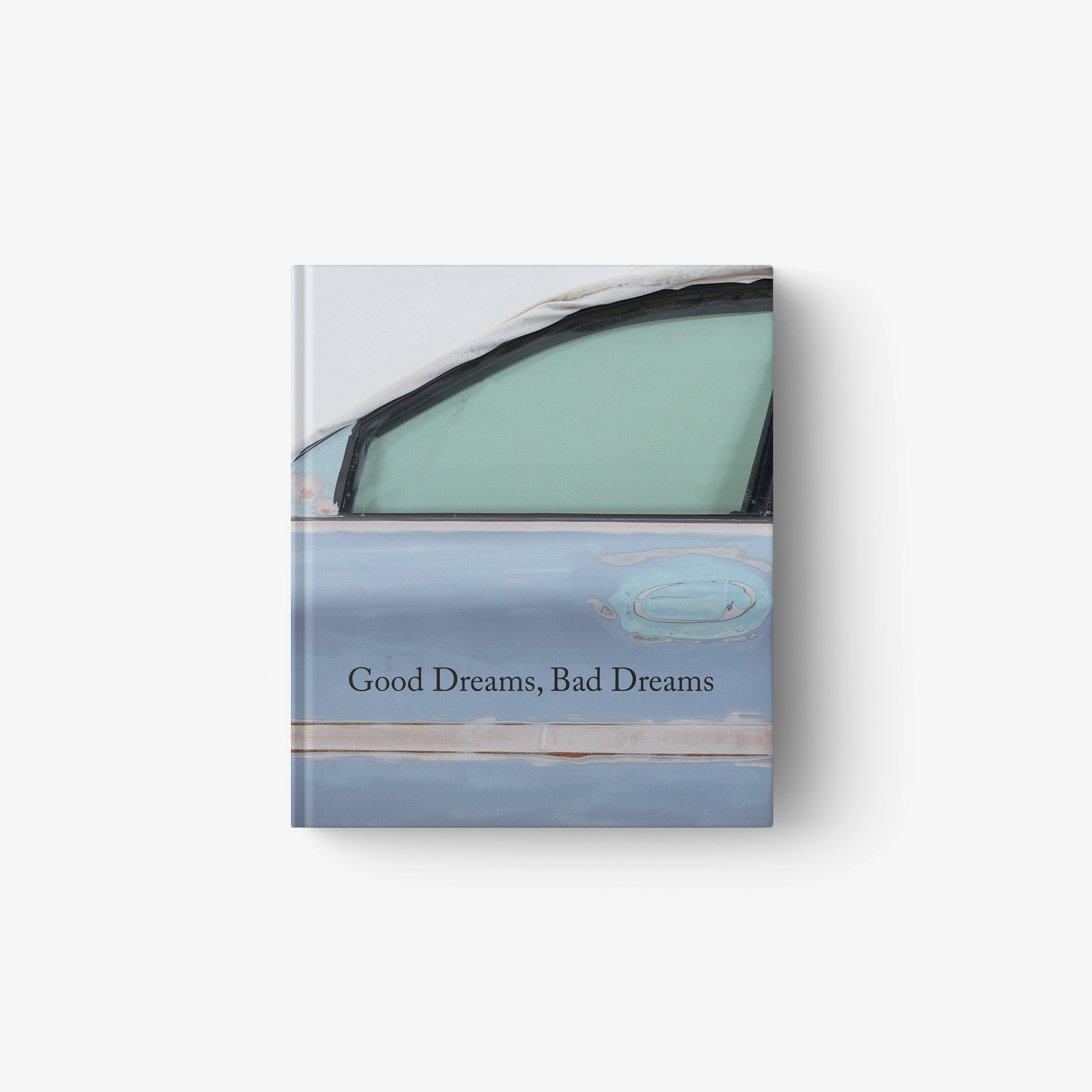 Blue hardcover book with white 'Good Dreams, Bad Dreams' title