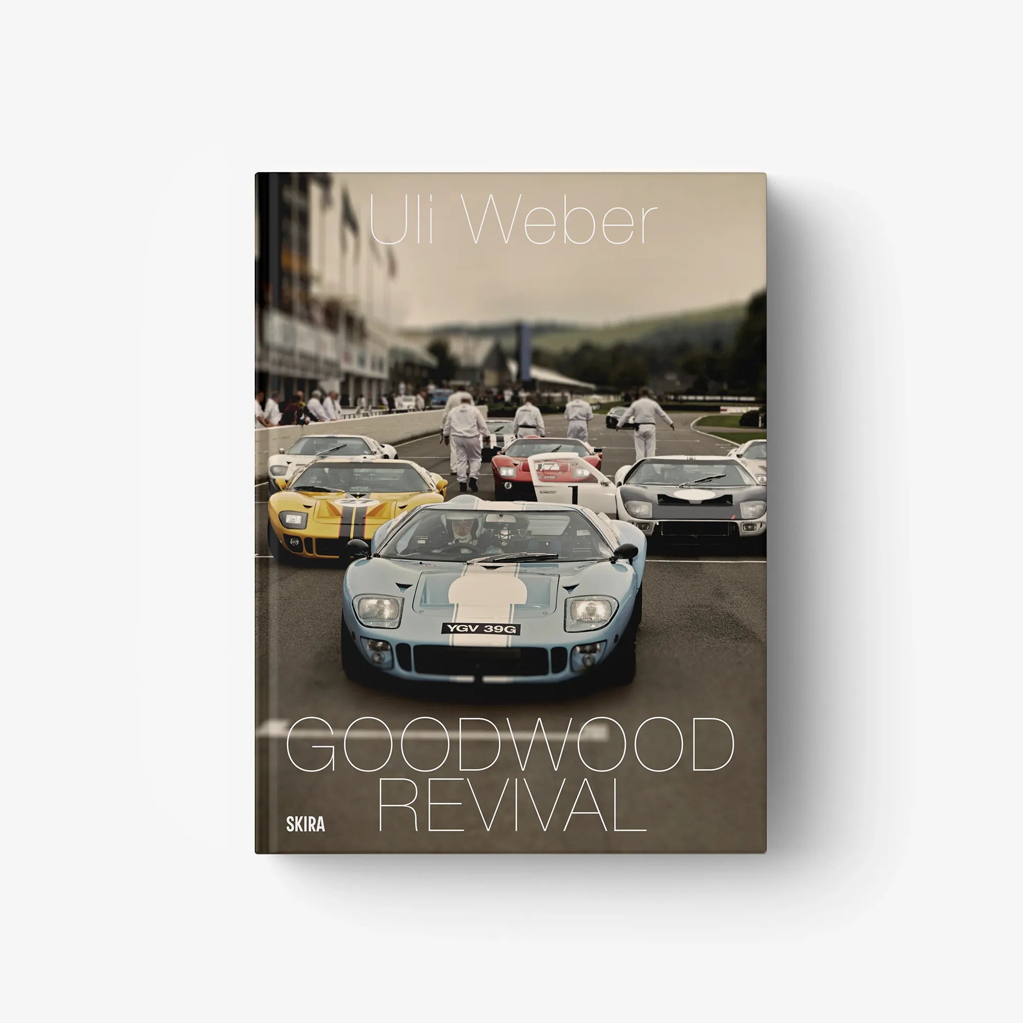 Goodwood Revival photo book cover with vintage race cars and title text
