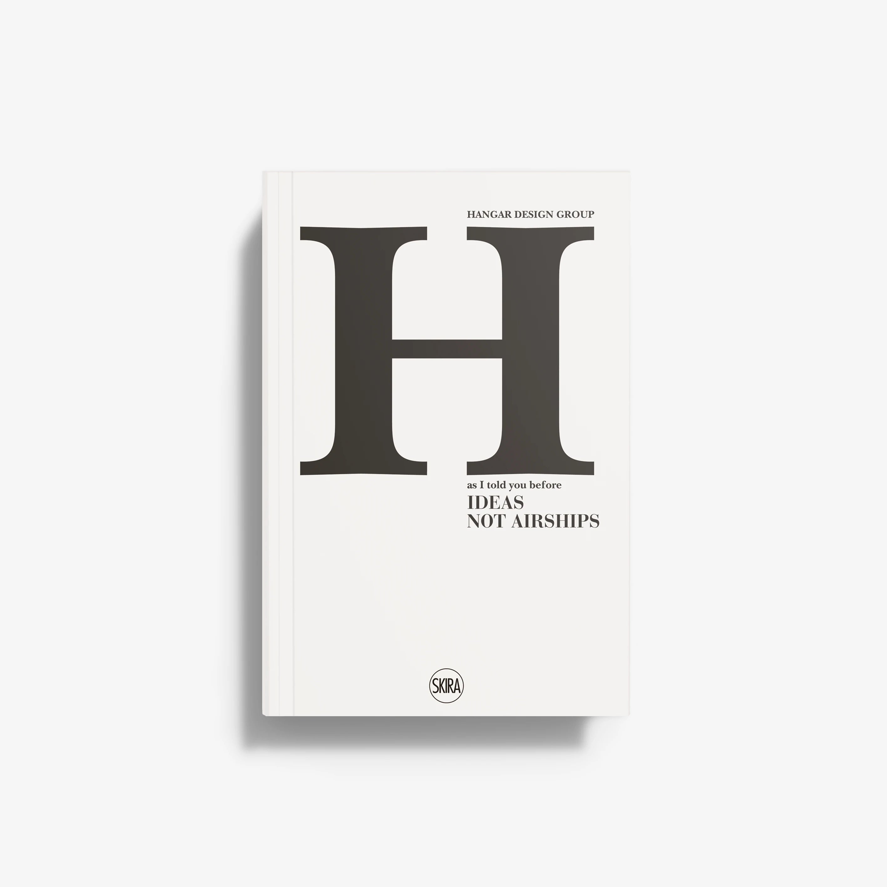Hardcover book with white cover, large black letter H, and SKIRA logo at bottom