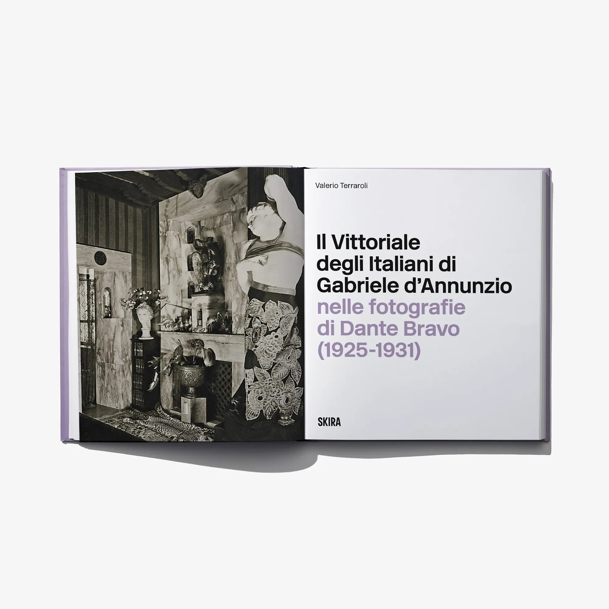 Photo book in open slipcase with title text and black-and-white interior photo