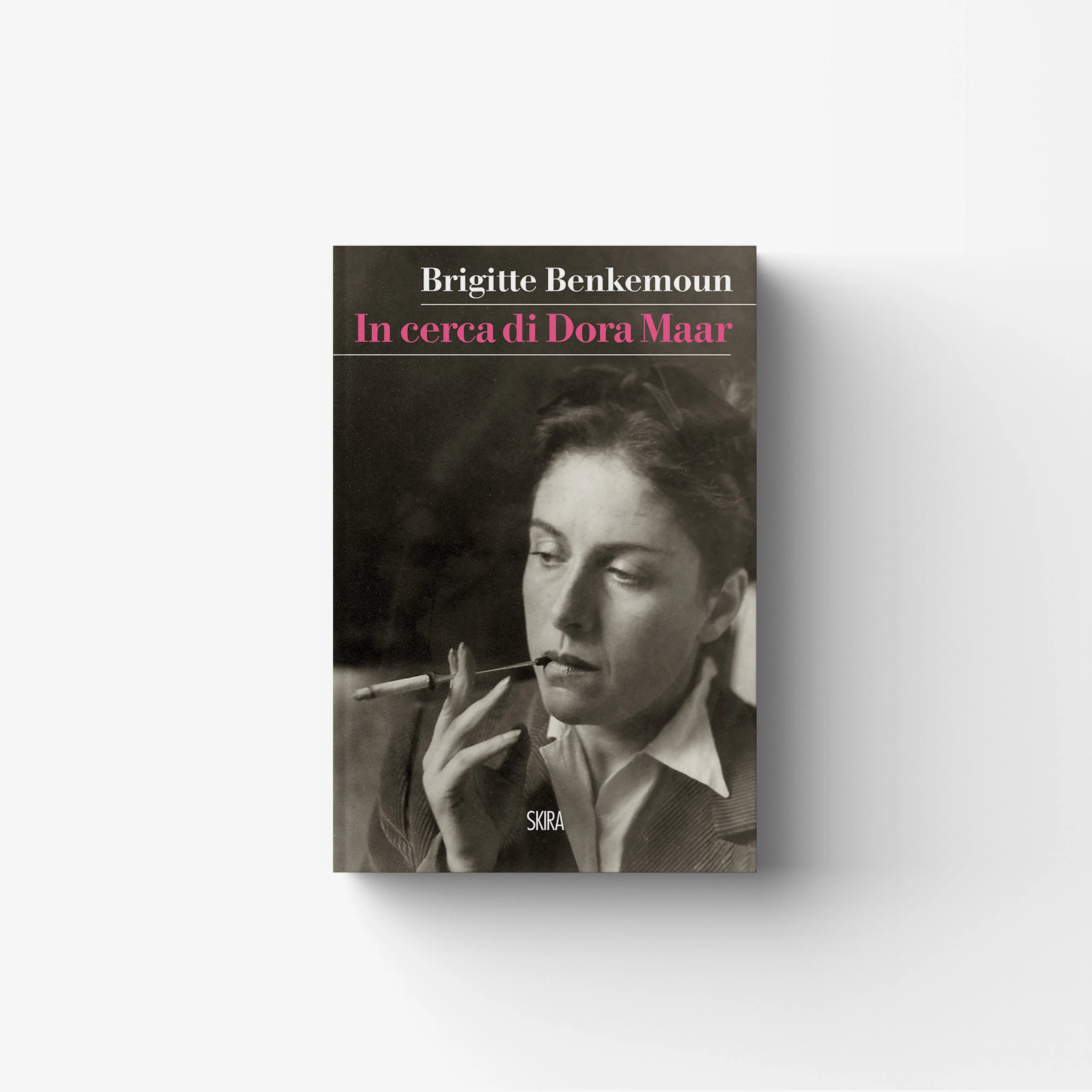 Art history book by Skira Arte with black cover and pink title text, featuring a black and white portrait