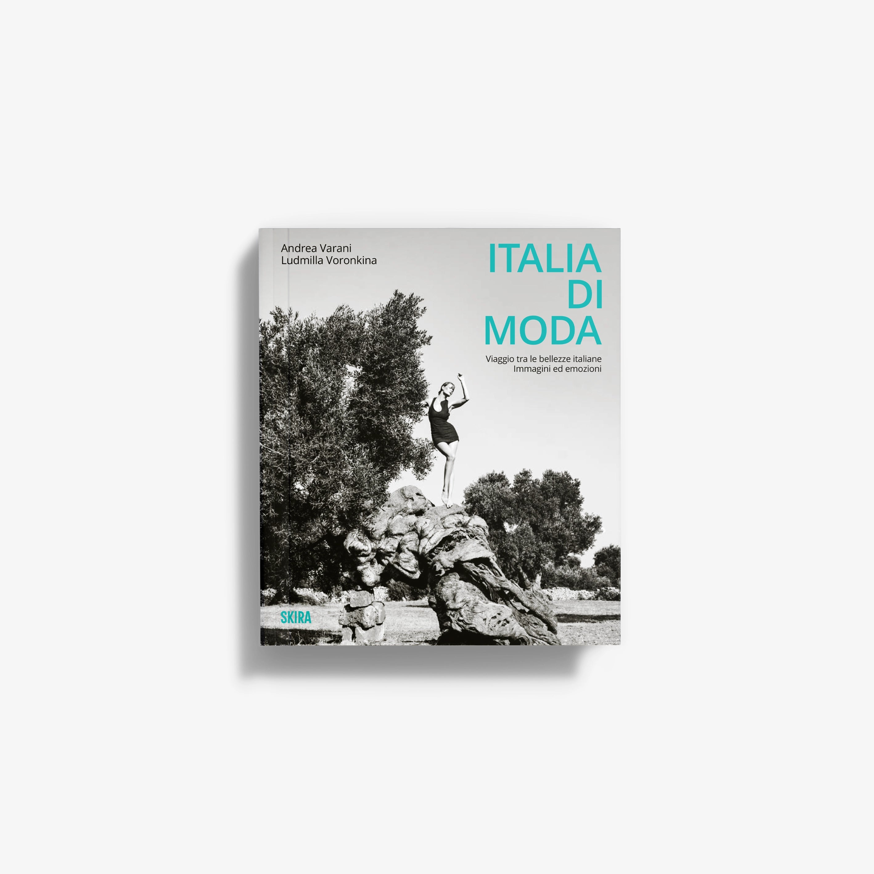 Fashion Italy book with white cover, turquoise title text, and black-and-white statue photo